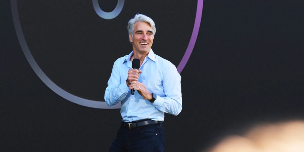 Craig Federighi talking onstage at an Apple Event.