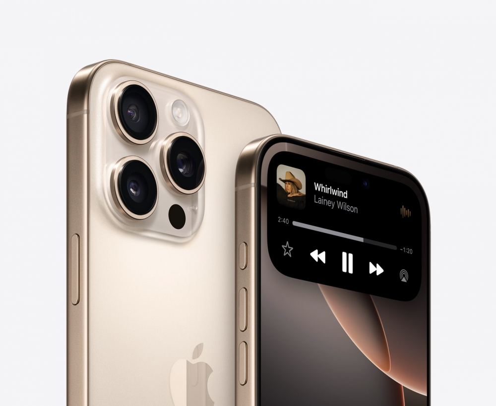 iPhone 16 Pro in Desert Titanium.