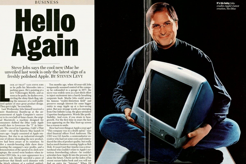 Steve Jobs holding the Macintosh (vintage)