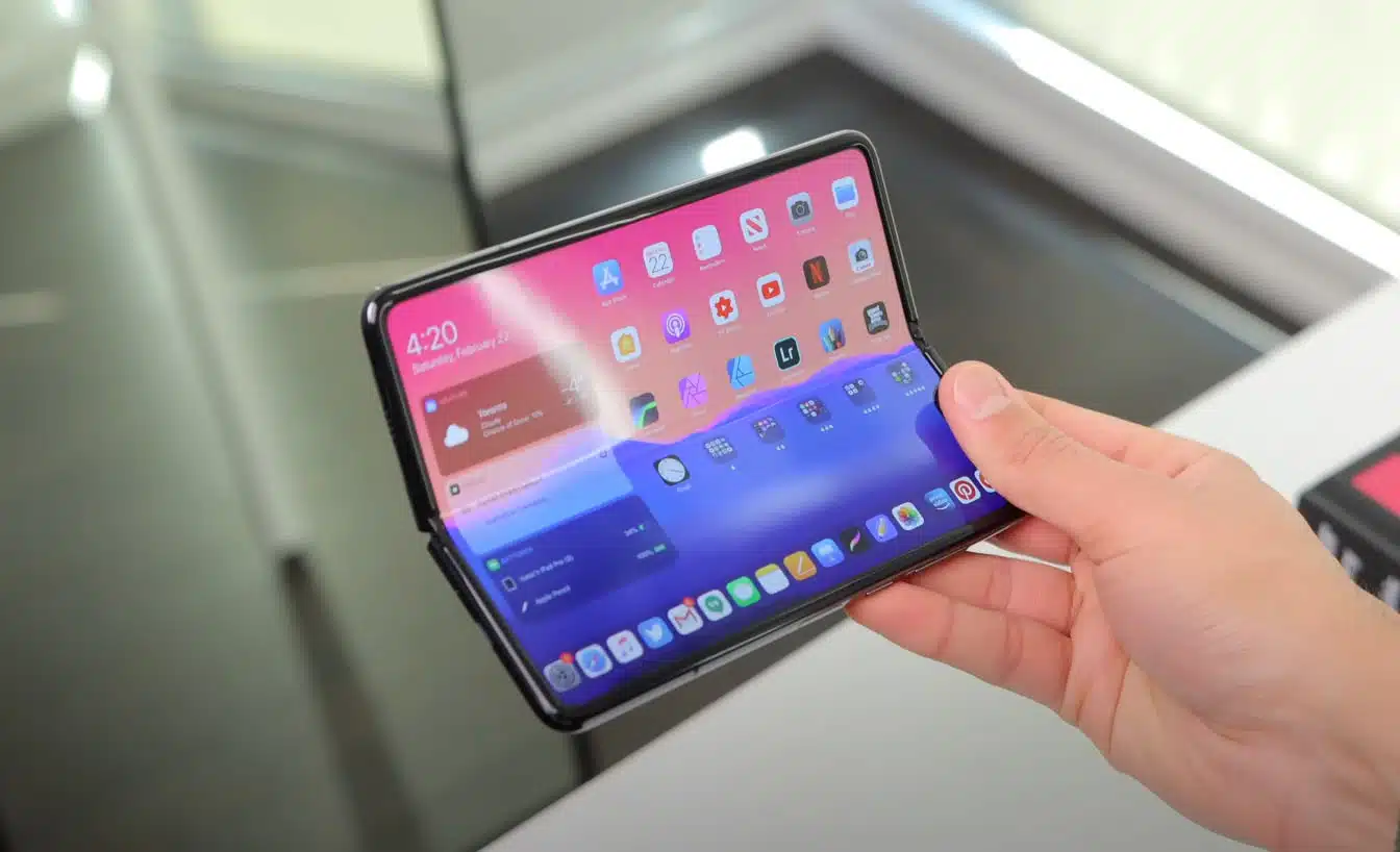 A concept of Apple's upcoming foldable iPhone, shown unfolding like a book.