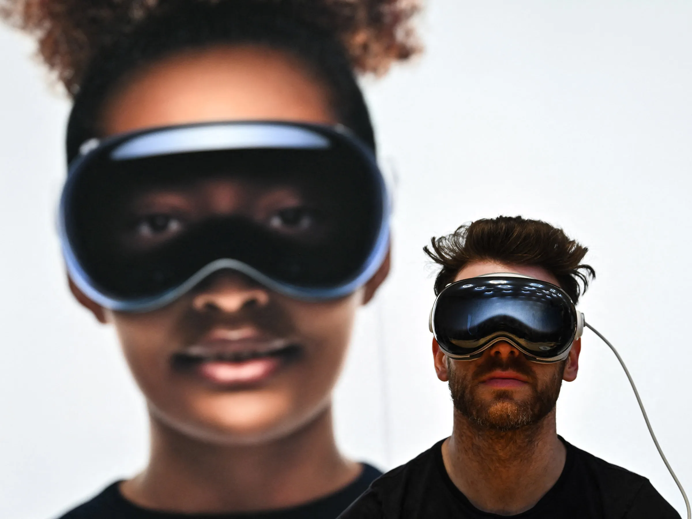 A man trials Apple's Vision Pro headset in an Apple Store.