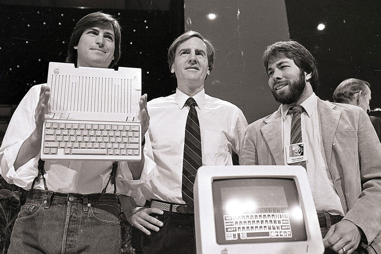 From left to right: Steve Jobs, John Sculley, Steve Wozniak.