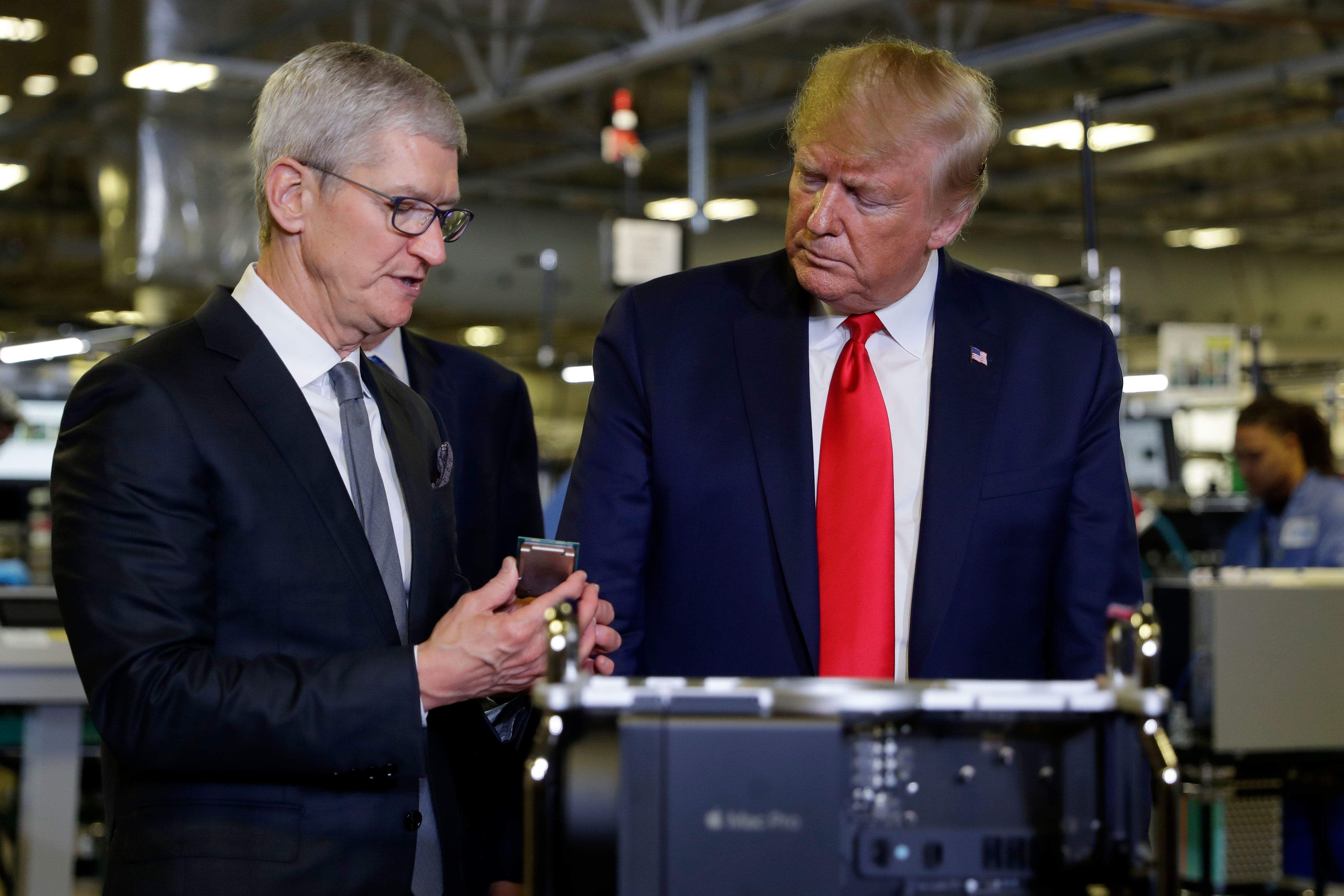 Tim Cook, CEO of Apple, with Donald Trump, the next American President.