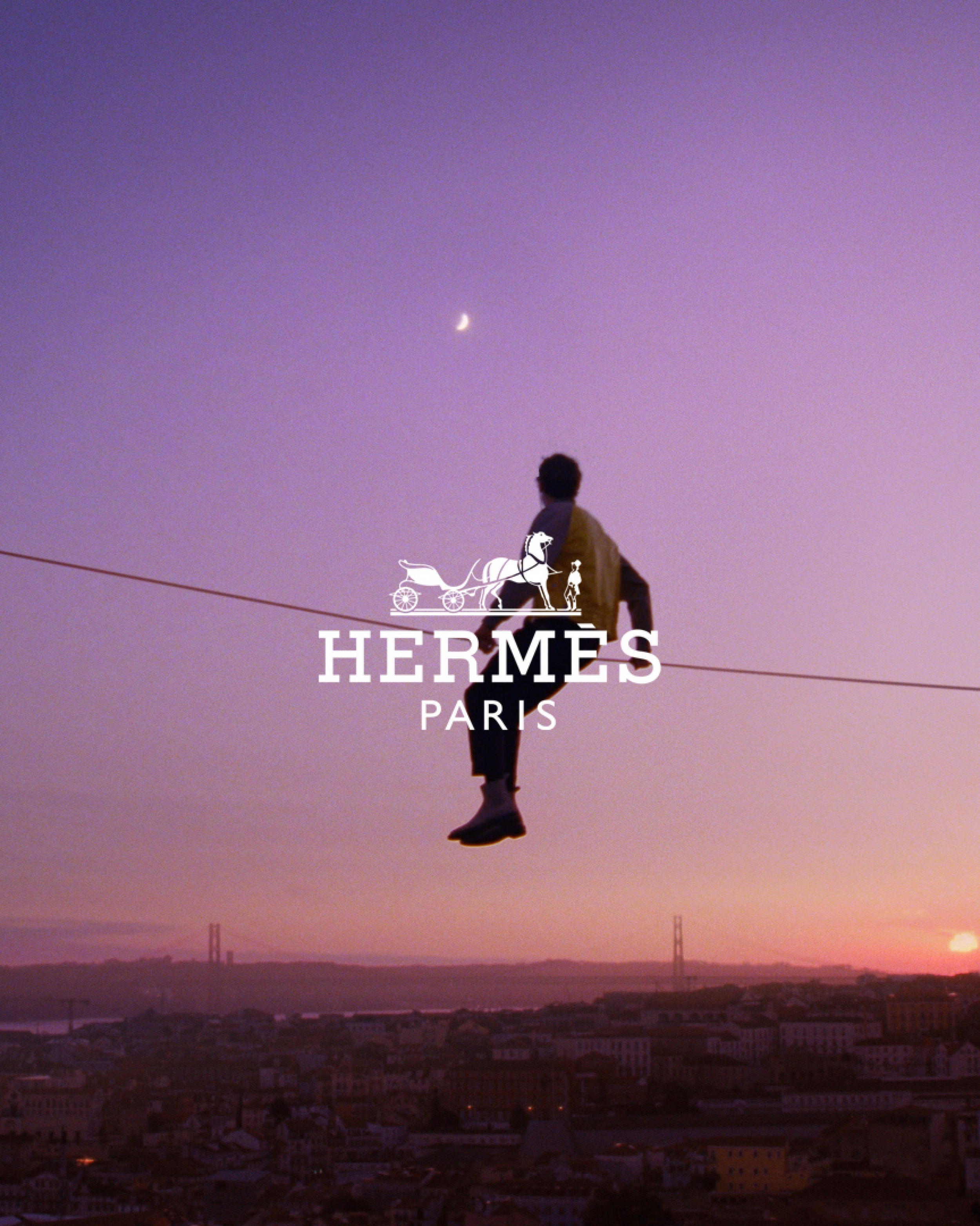 Hermes Paris Official Logo Official Marketing Sunset Tightrope wallpaper for Apple iPhone, Apple Watch, Mac, iPad and Apple Watch