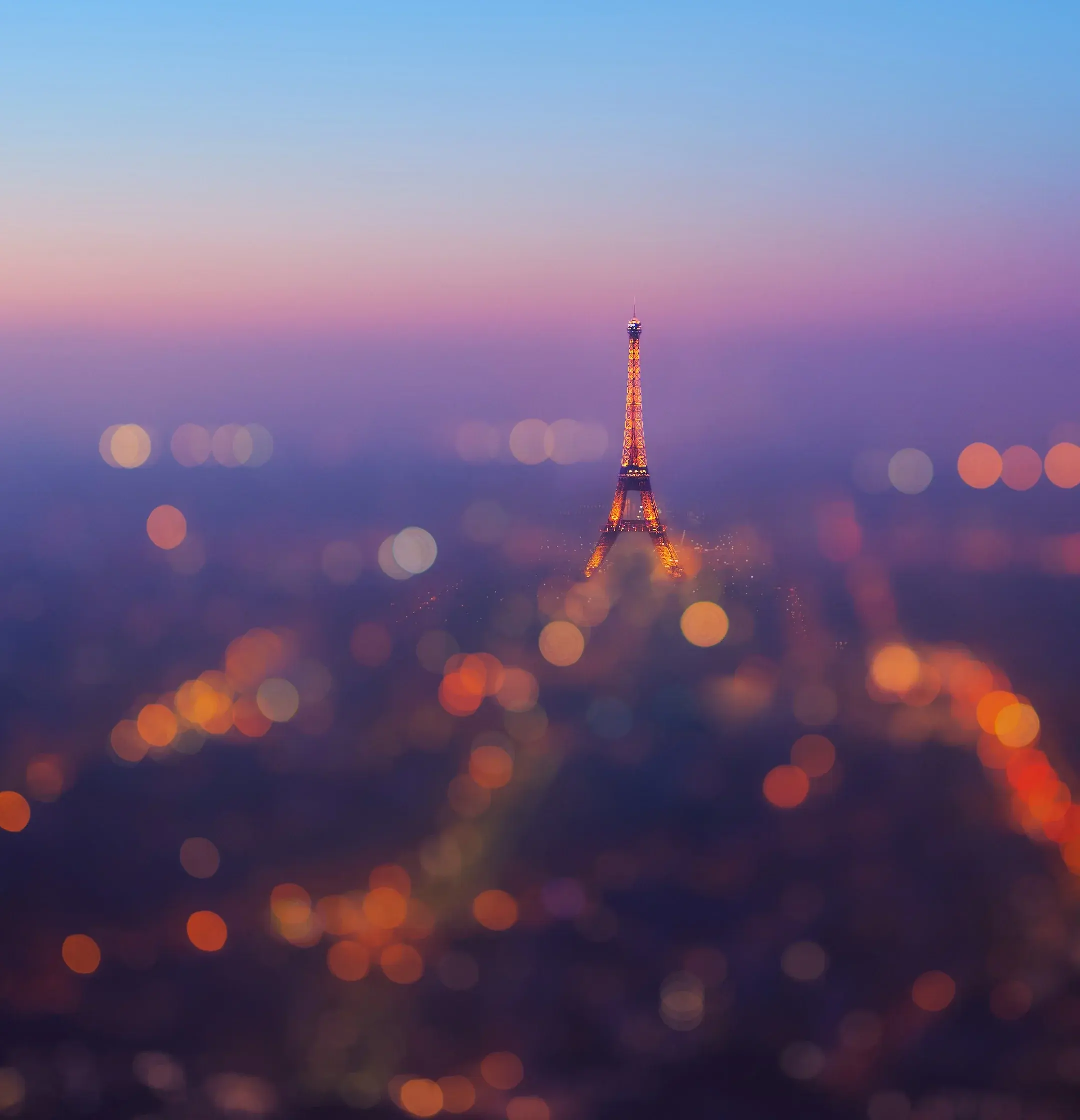 Huawei HarmonyOS Google Android Stock Default Paris France Eiffel Tower Blurred wallpaper for Apple iPhone, Apple Watch, Mac, iPad and Apple Watch