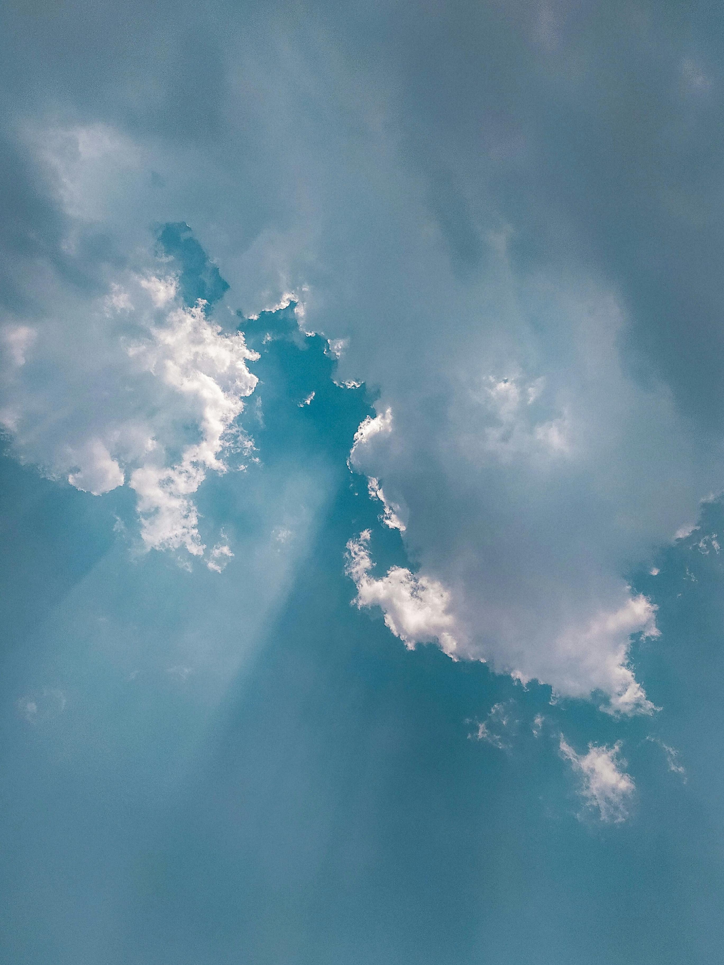 Light Rays Beaming Down From Clouds wallpaper for Apple iPhone, Apple Watch, Mac, iPad and Apple Watch
