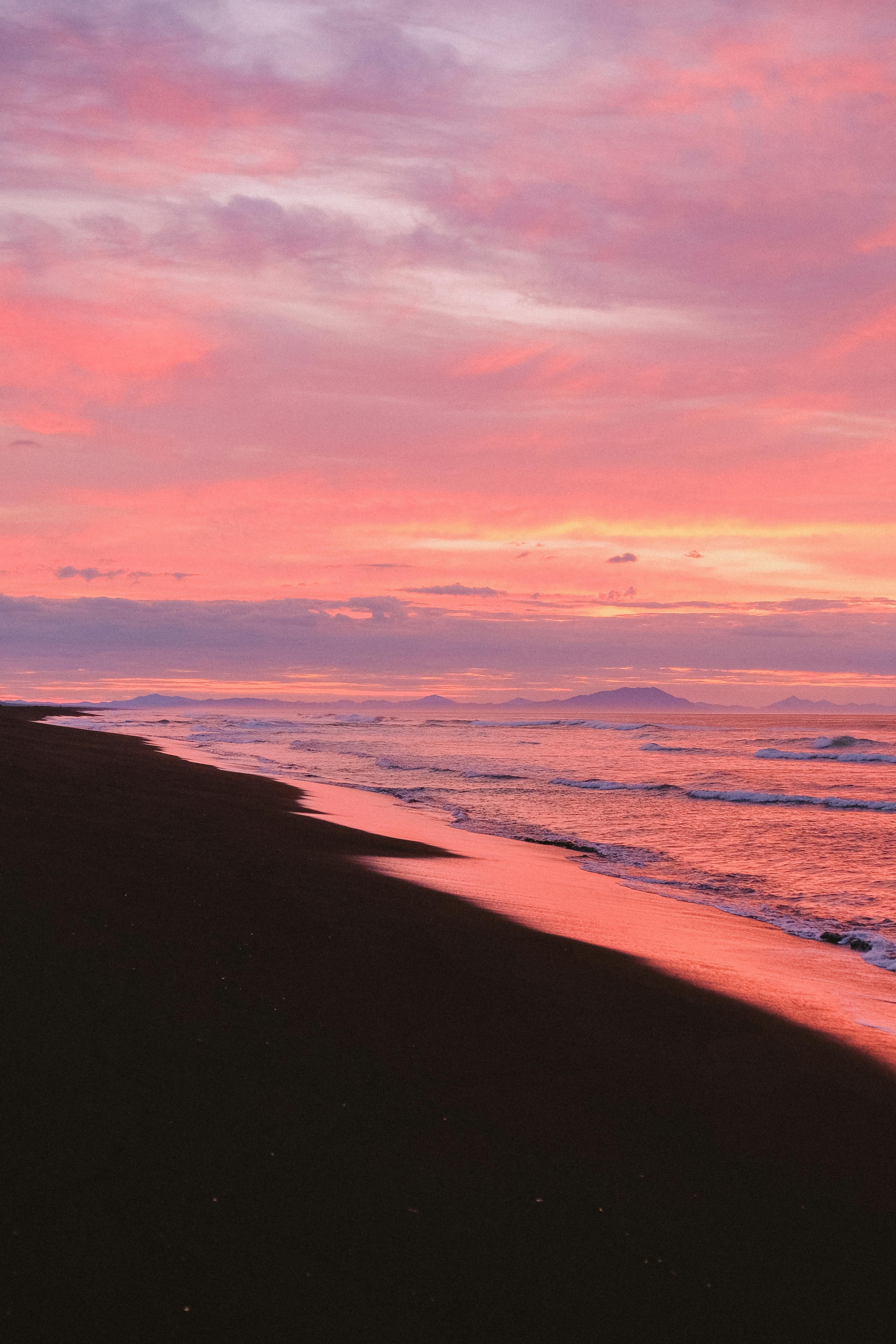 Pink Orange Sunset At The Beach wallpaper for Apple iPhone, Apple Watch, Mac, iPad and Apple Watch