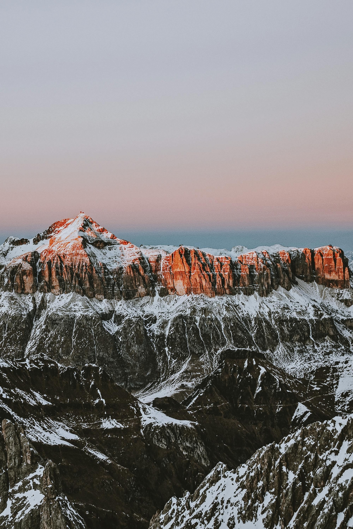 Snow Covered Mountains At Sunrise