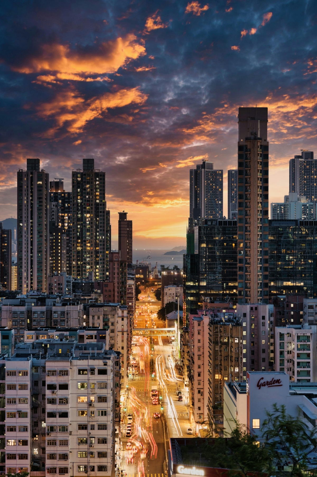 City Skyline At Sunset With Gorgeous Orange Clouds