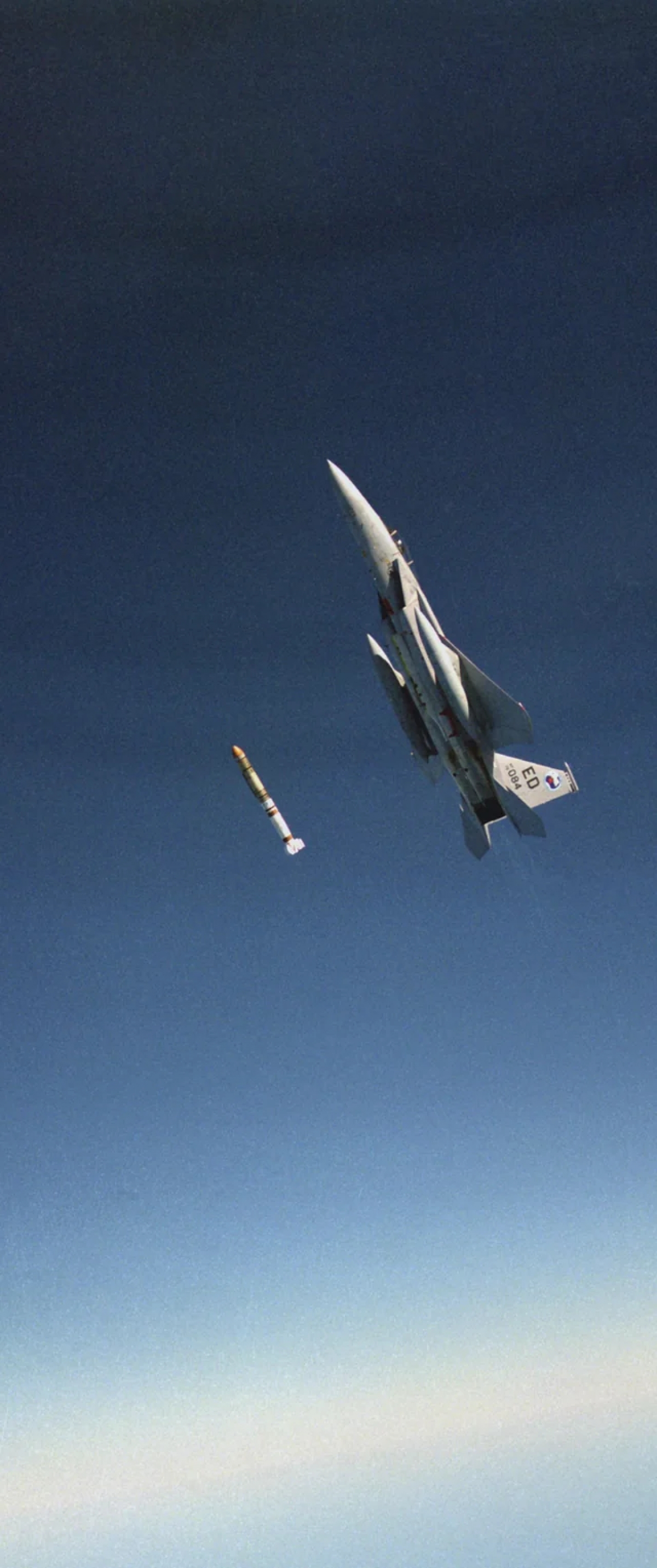 F15 Fighter Jet Shooting Down A Satellite — Download Free iPhone Wallpapers