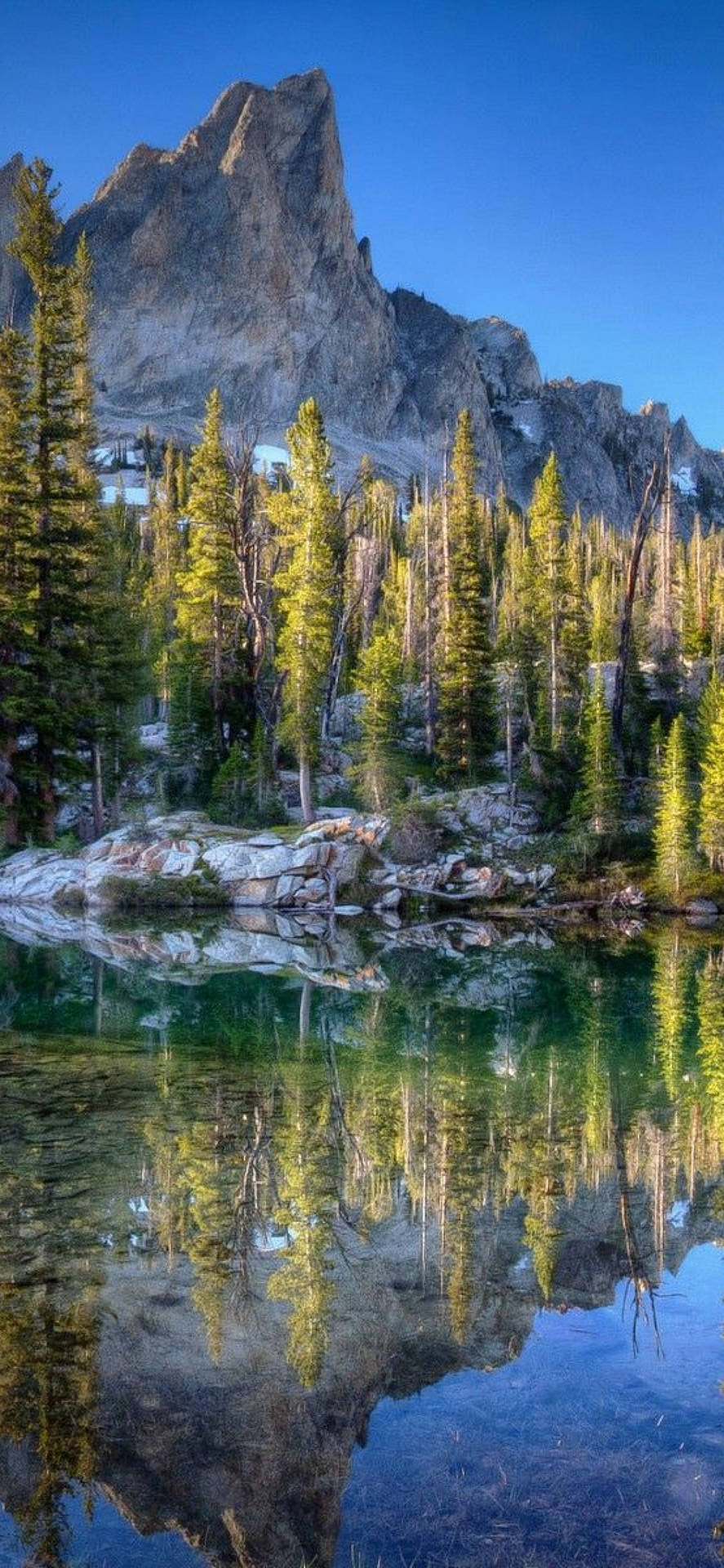 A Rocky Mountain With Blue Sky And Trees In Idaho State United States USA wallpaper for Apple iPhone, Apple Watch, Mac, iPad and Apple Watch