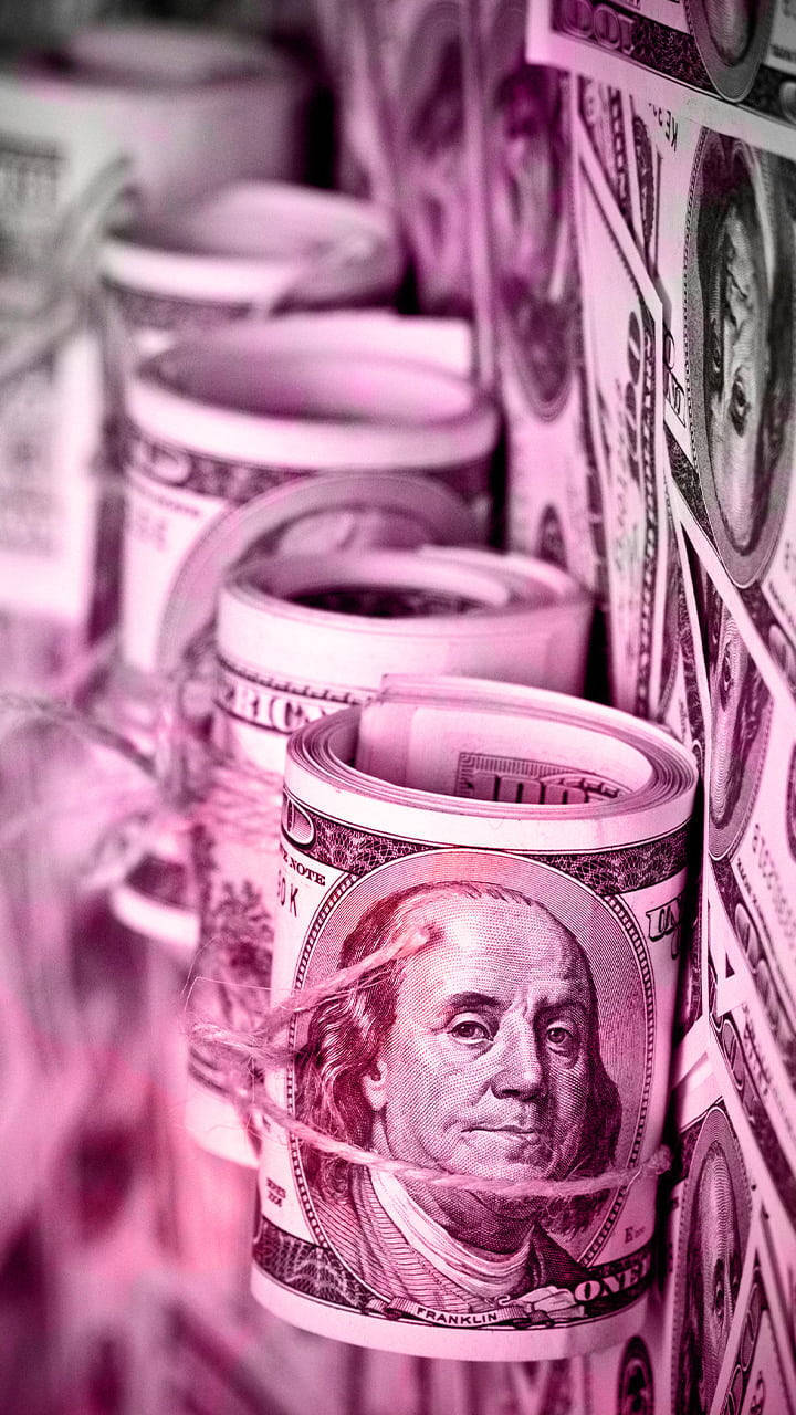 American Cash Money Dollars Currency USA Rolls Of Notes Pink wallpaper for Apple iPhone, Apple Watch, Mac, iPad and Apple Watch