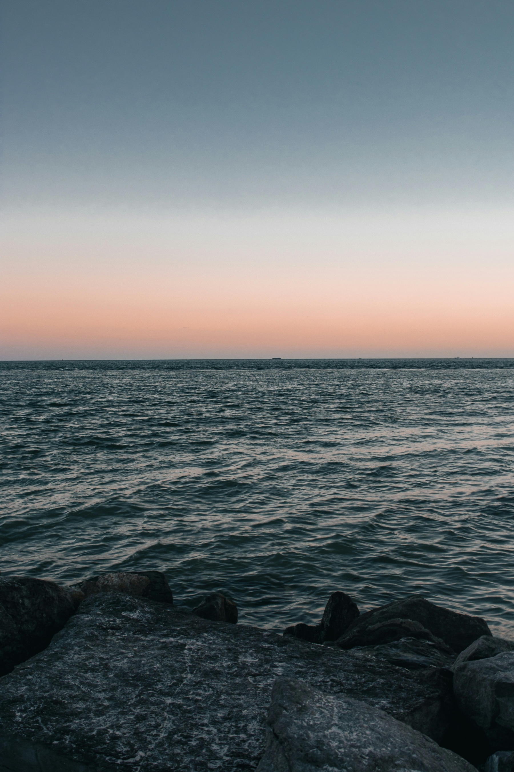 Black Rock Beach Sunset wallpaper for Apple iPhone, Apple Watch, Mac, iPad and Apple Watch