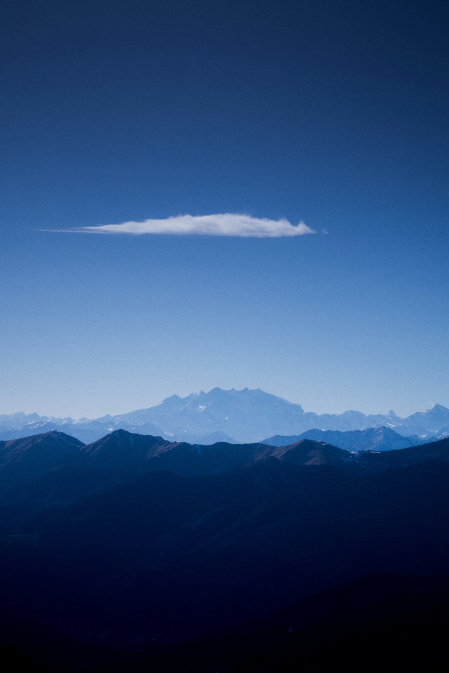 Bluesky With Mountains And Singular Cloud