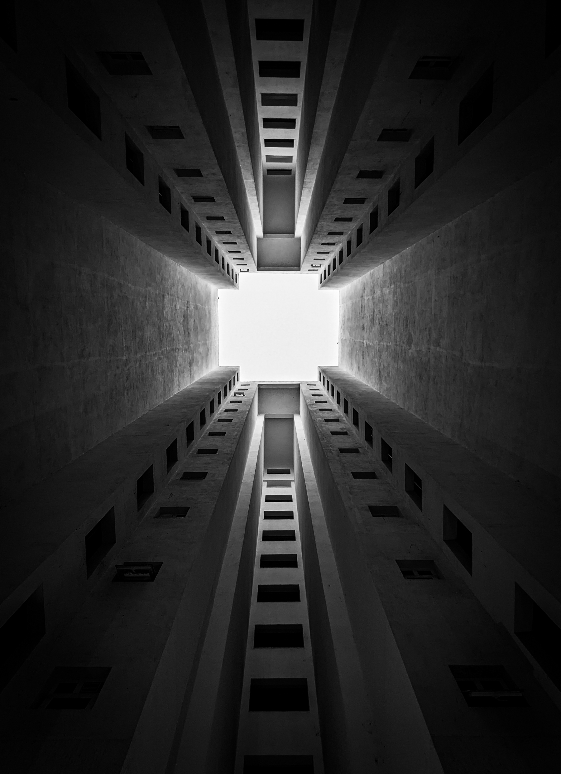 Brutalist Architecture From Below Black And White wallpaper for Apple iPhone, Apple Watch, Mac, iPad and Apple Watch