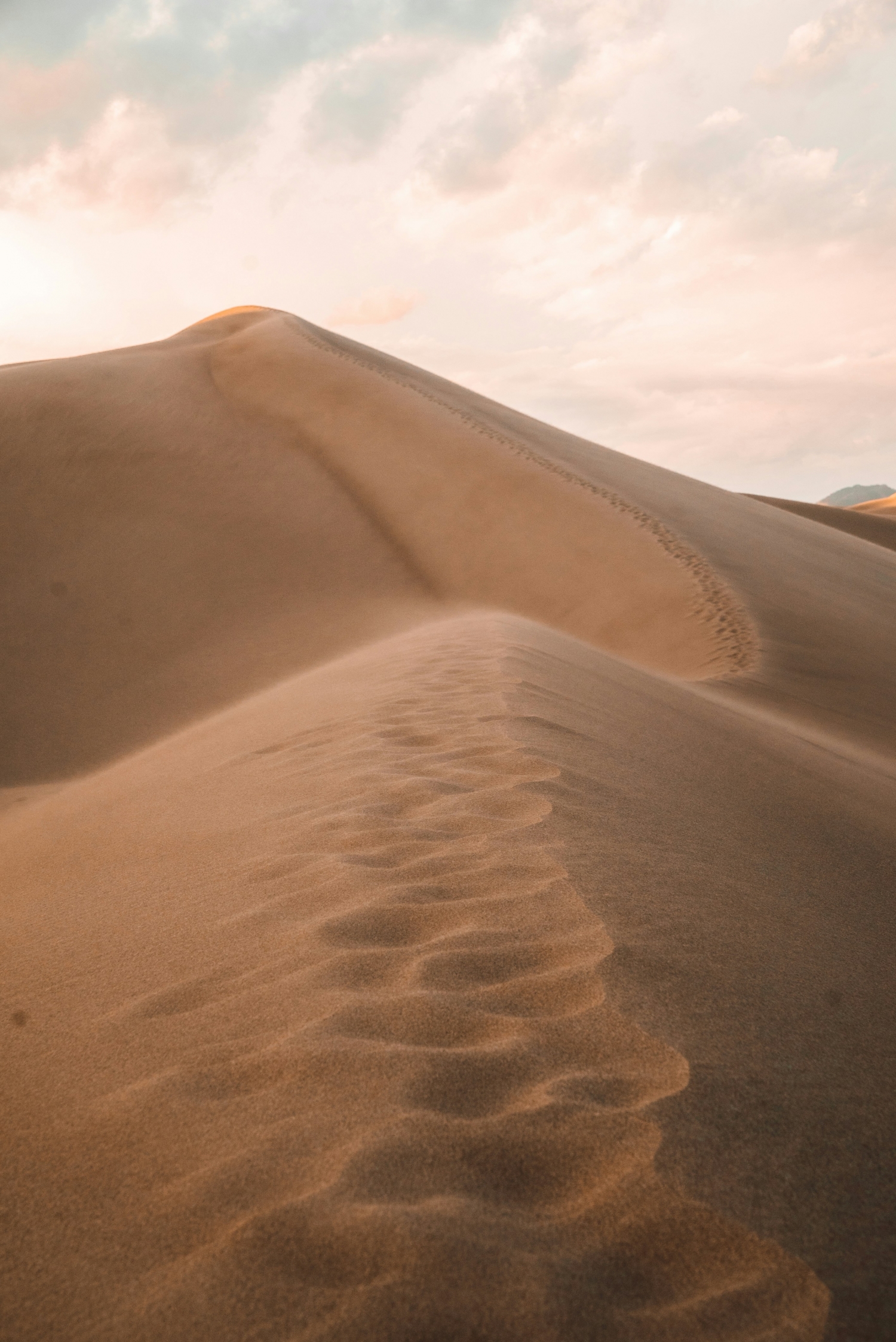 Desert Sand Dunes With Clouds