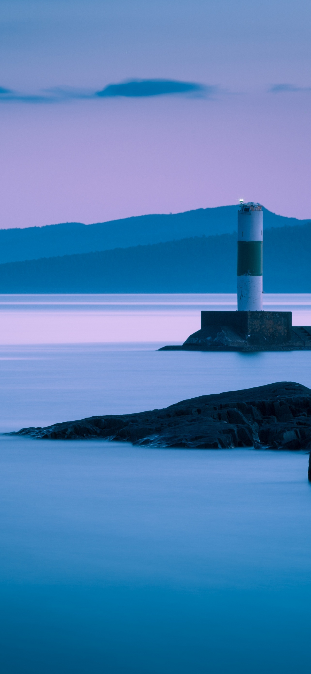 Grand Marais Lighthouse Coastline Long Exposure Breakwaters wallpaper for Apple iPhone, Apple Watch, Mac, iPad and Apple Watch