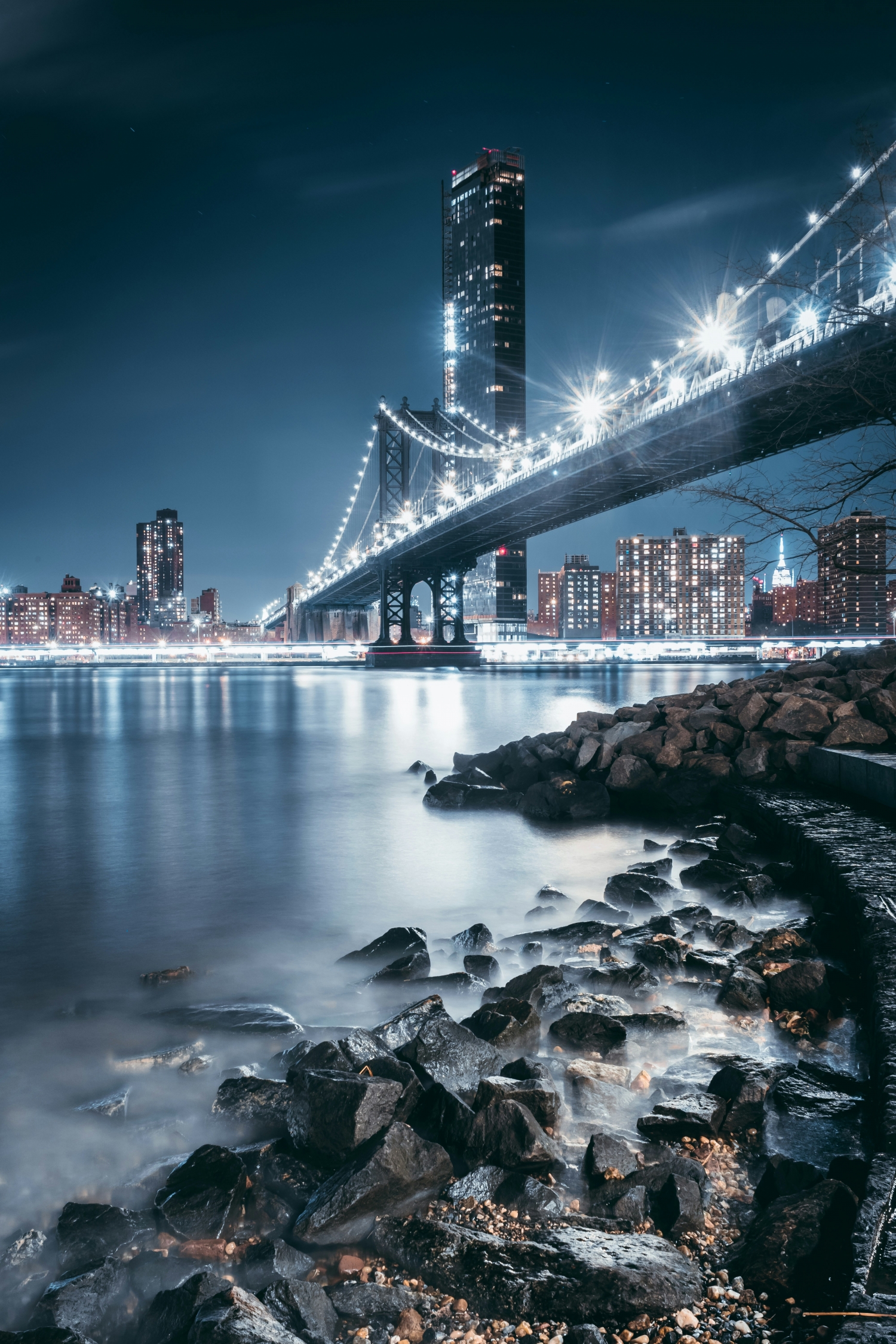 Rocky Beach In Winter New York City Bridge