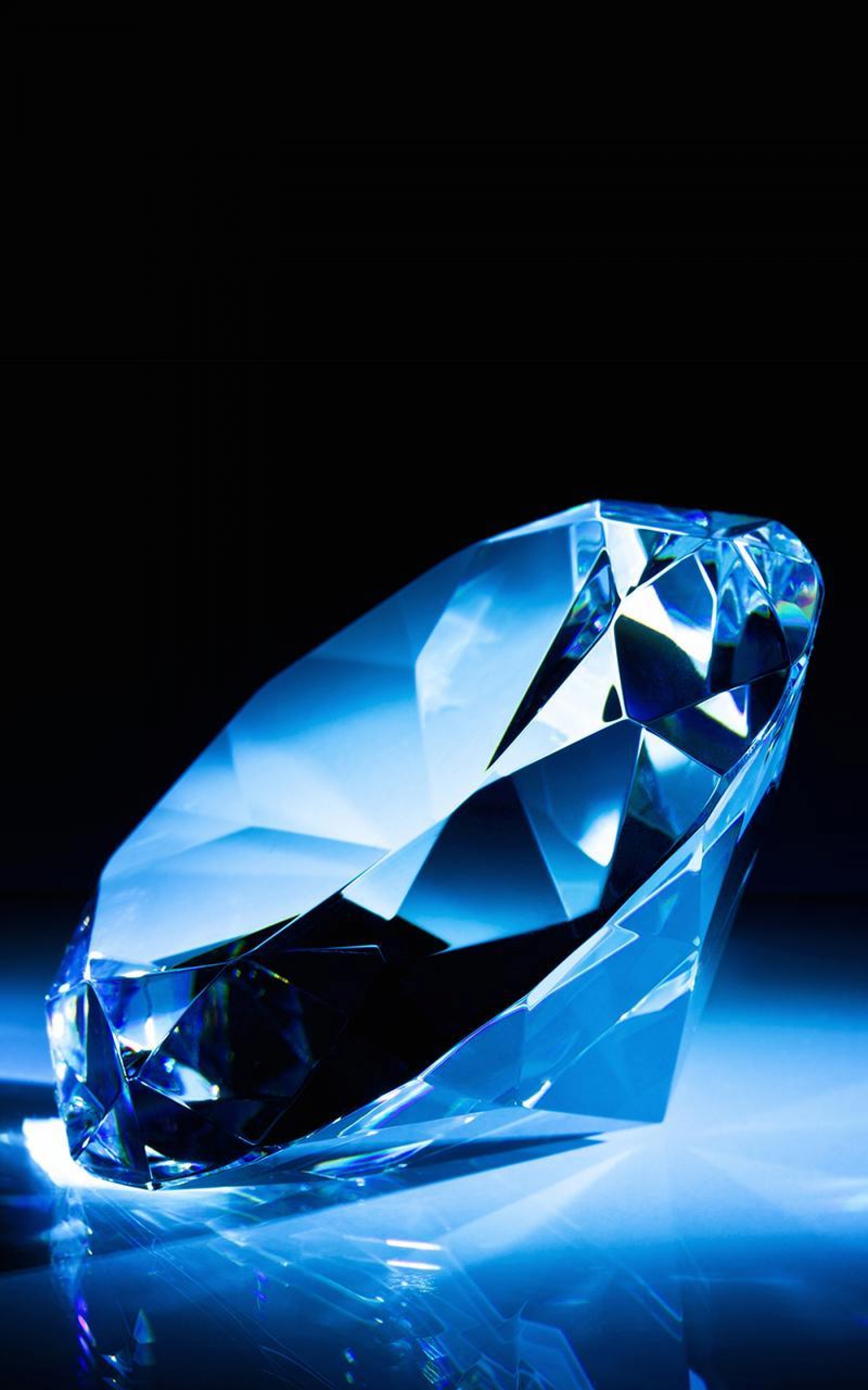 Shiny Blue Diamond Gemstone Precious Stone wallpaper for Apple iPhone, Apple Watch, Mac, iPad and Apple Watch