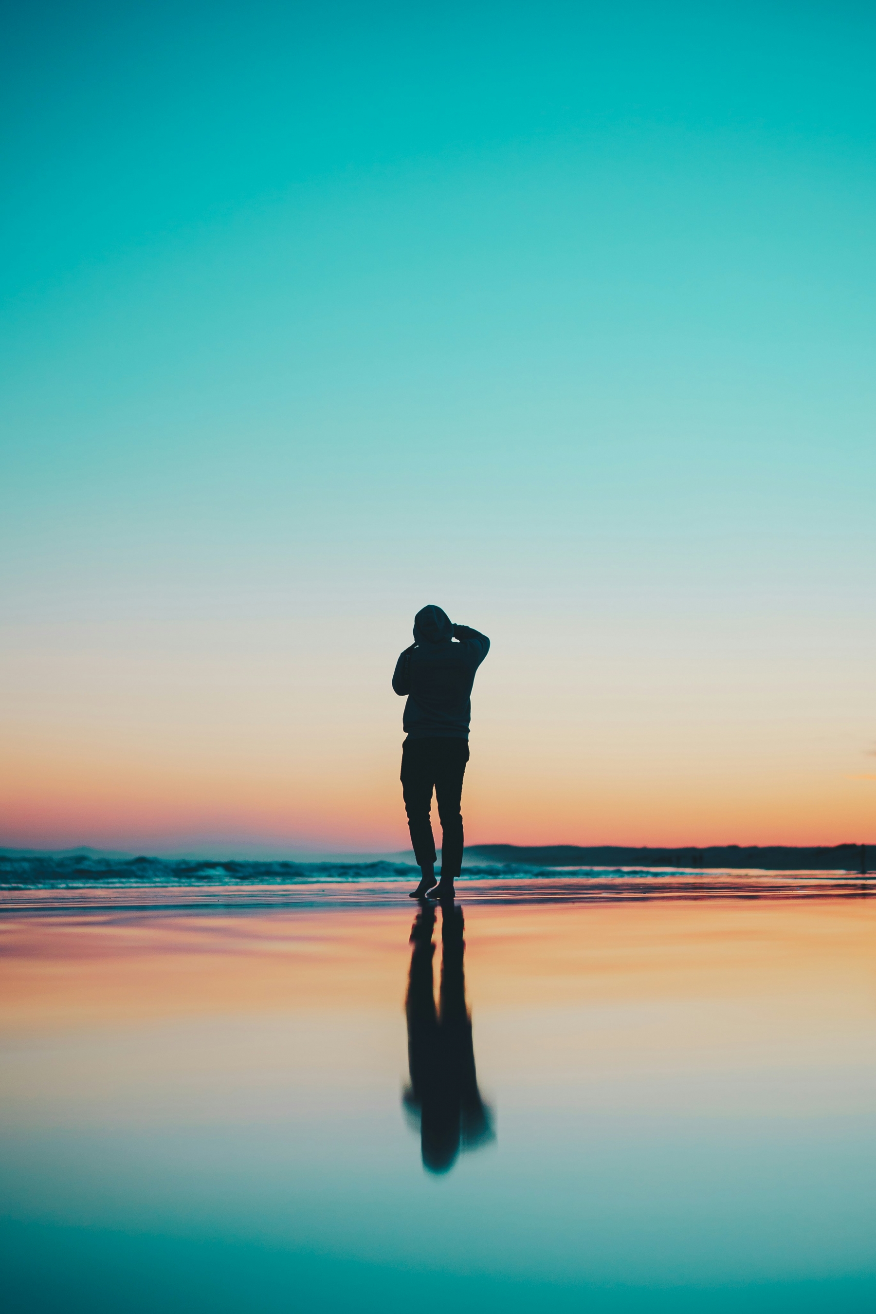 Silhouette Of A Photographer At Sunrise On The Beach wallpaper for Apple iPhone, Apple Watch, Mac, iPad and Apple Watch