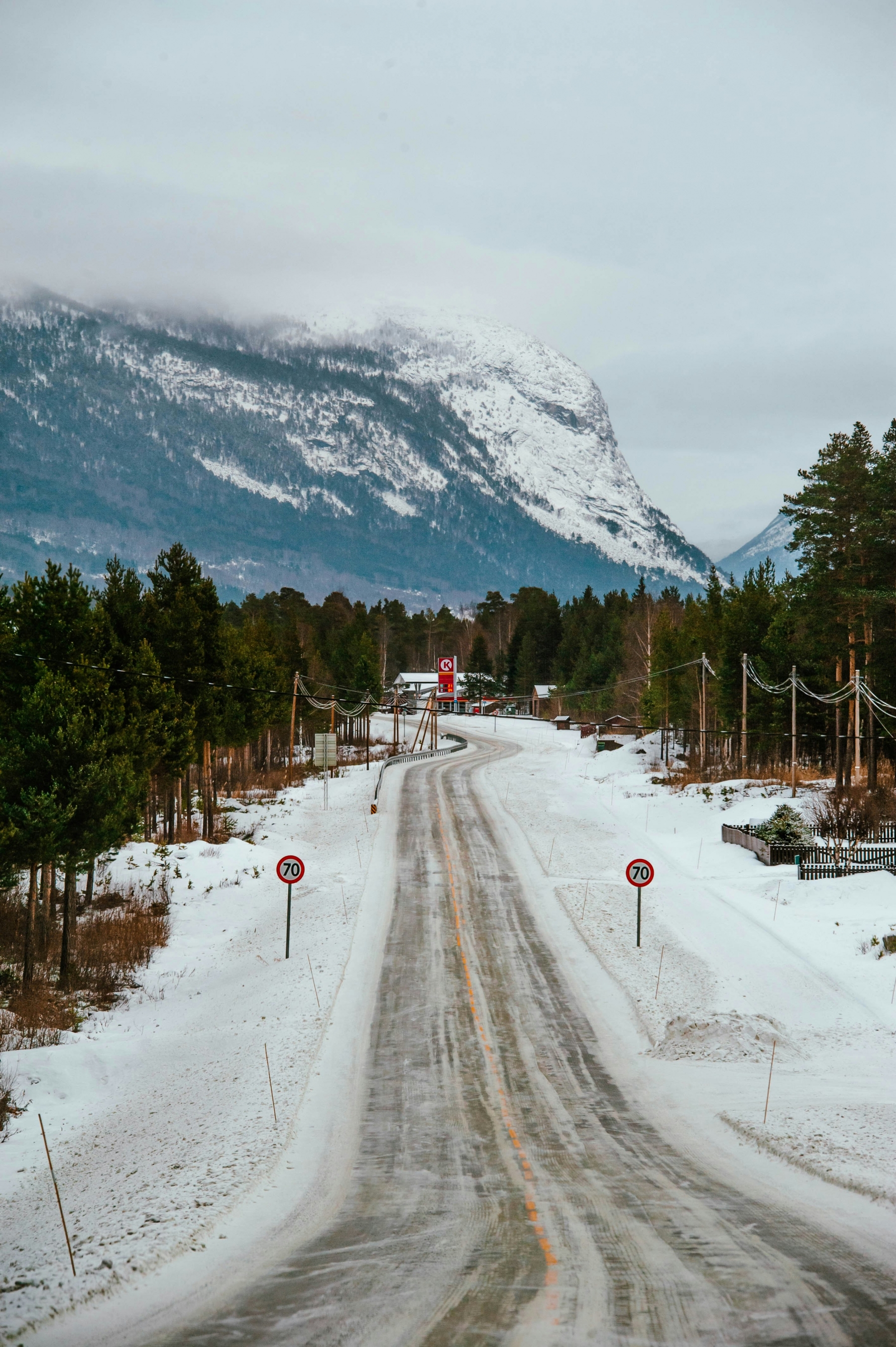 Snow Covered Road And Mountains View