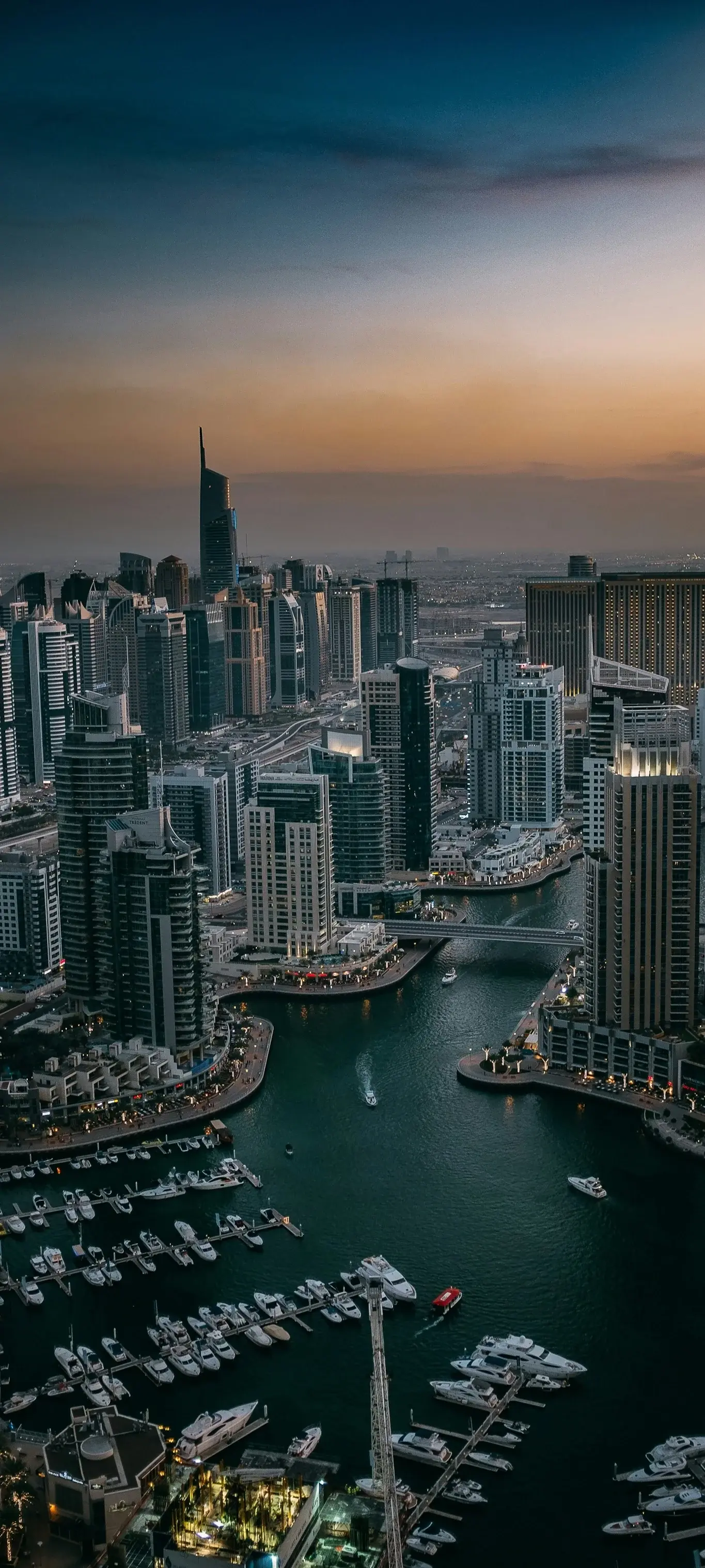 Sunset Over Boats And City In Dubai City United Arab Emirates UAE Luxury Living Skyscraper Skyline Vacation