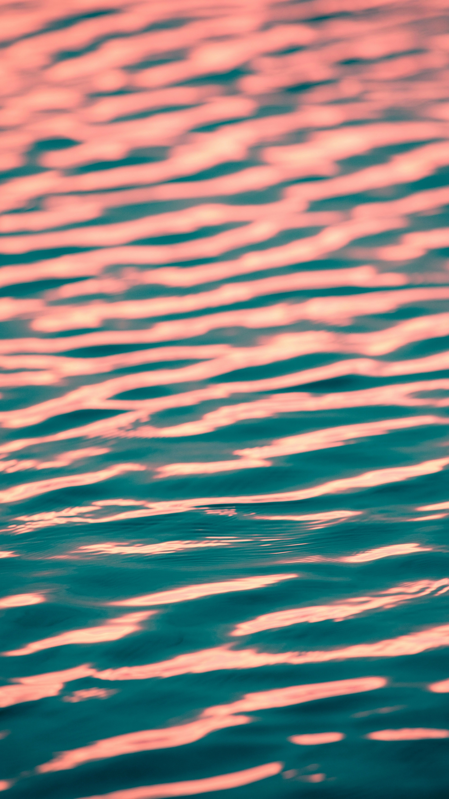 Sunset Reflects Off The Calm Ocean Waves wallpaper for Apple iPhone, Apple Watch, Mac, iPad and Apple Watch