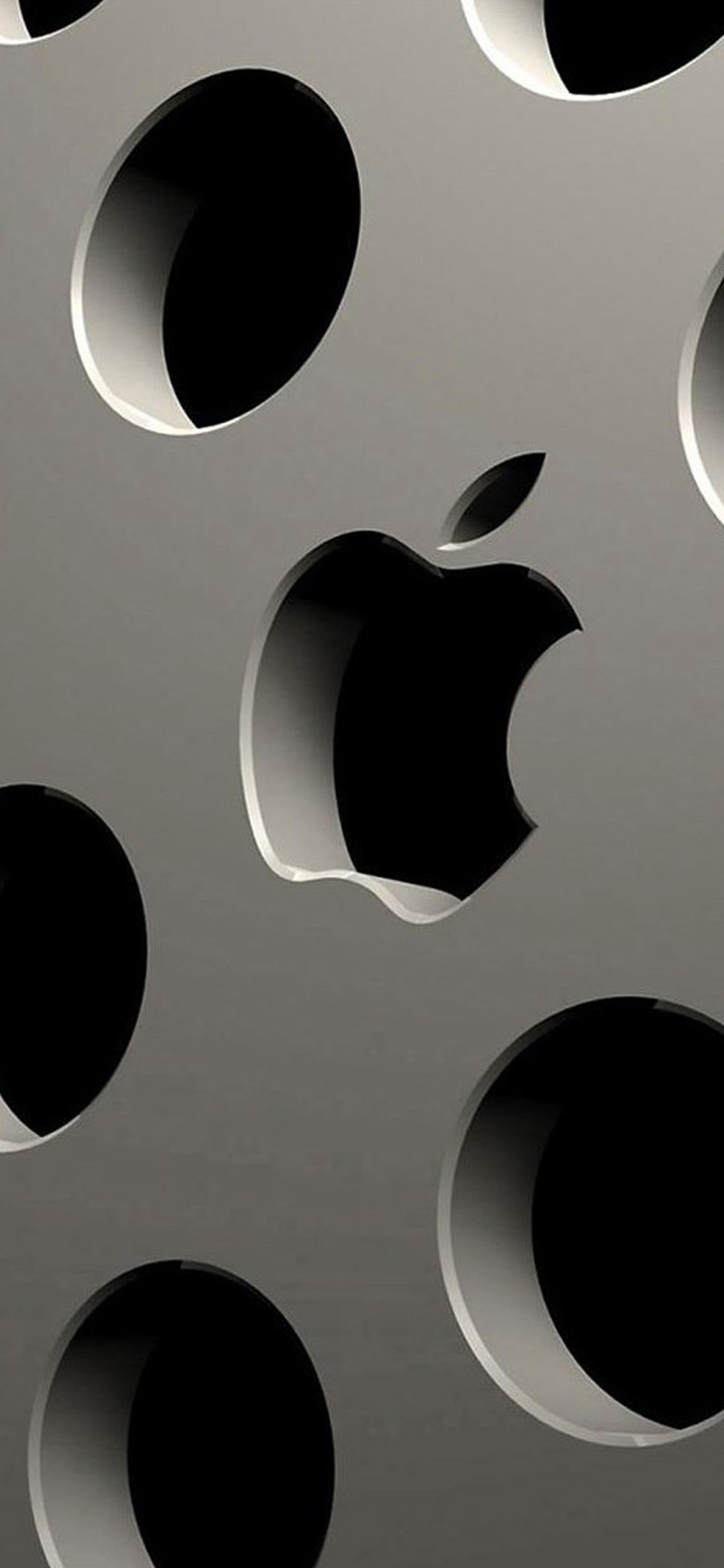 The Apple Logo Embossed Laser Etching In A Thick Piece Of Matte Metal Laser Cut