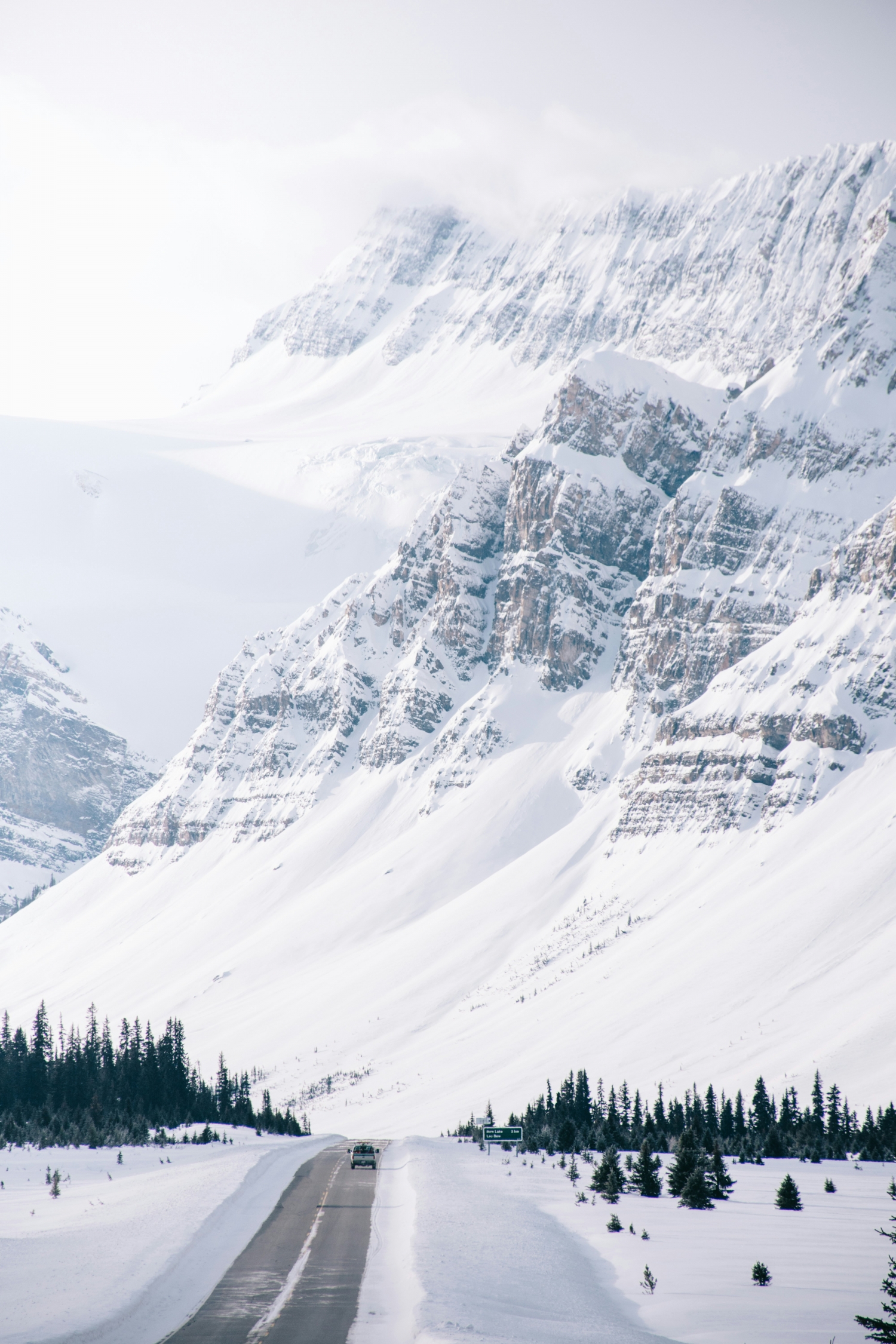 White Snowcapped Mountain In Middle Of Winter