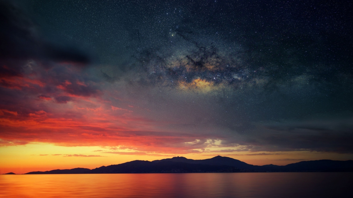 Dramatic Sunset With Mountain And Stars