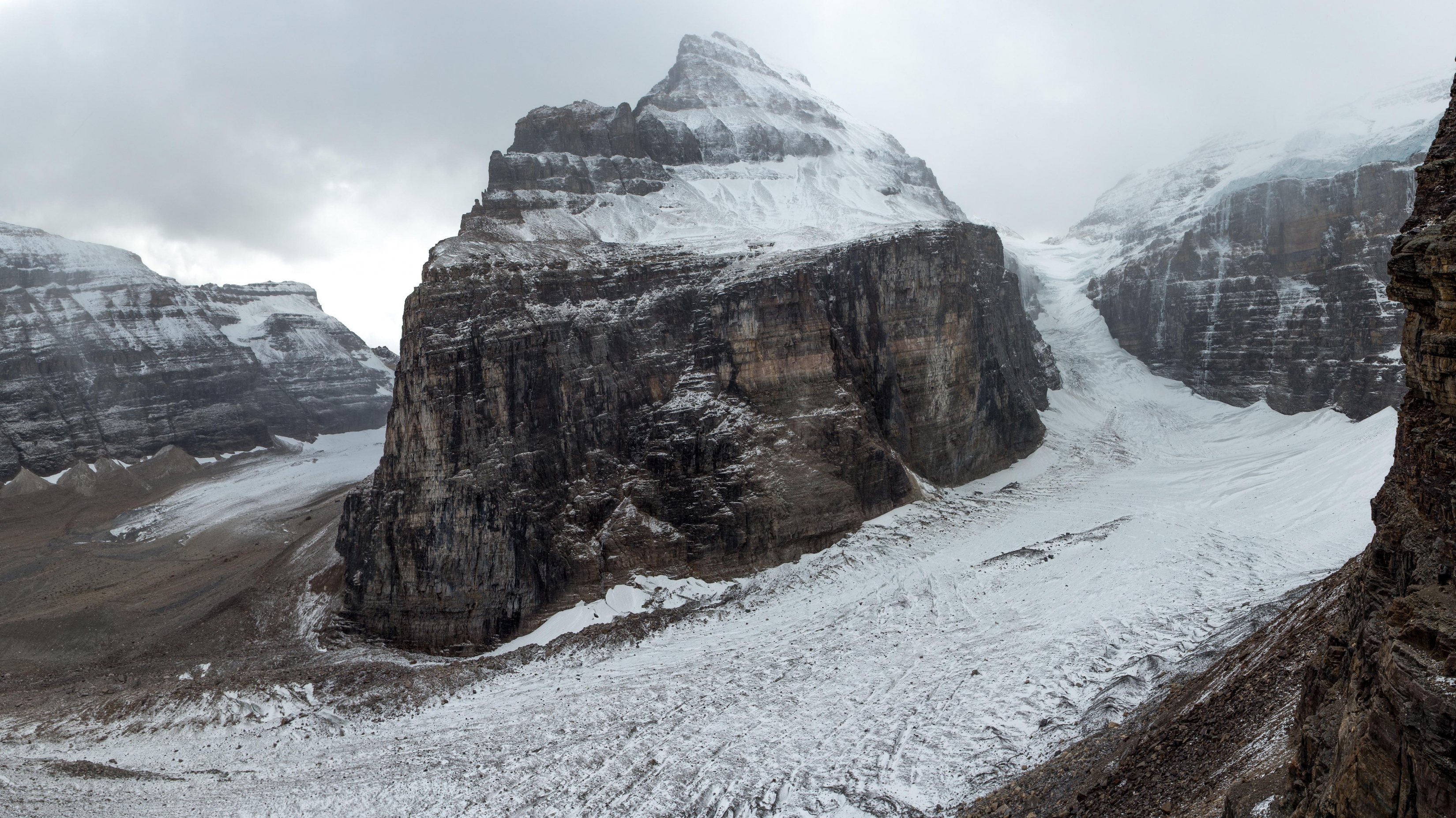 4K Black Rocks Snowcapped wallpaper for Apple iPhone, Apple Watch, Mac, iPad and Apple Watch