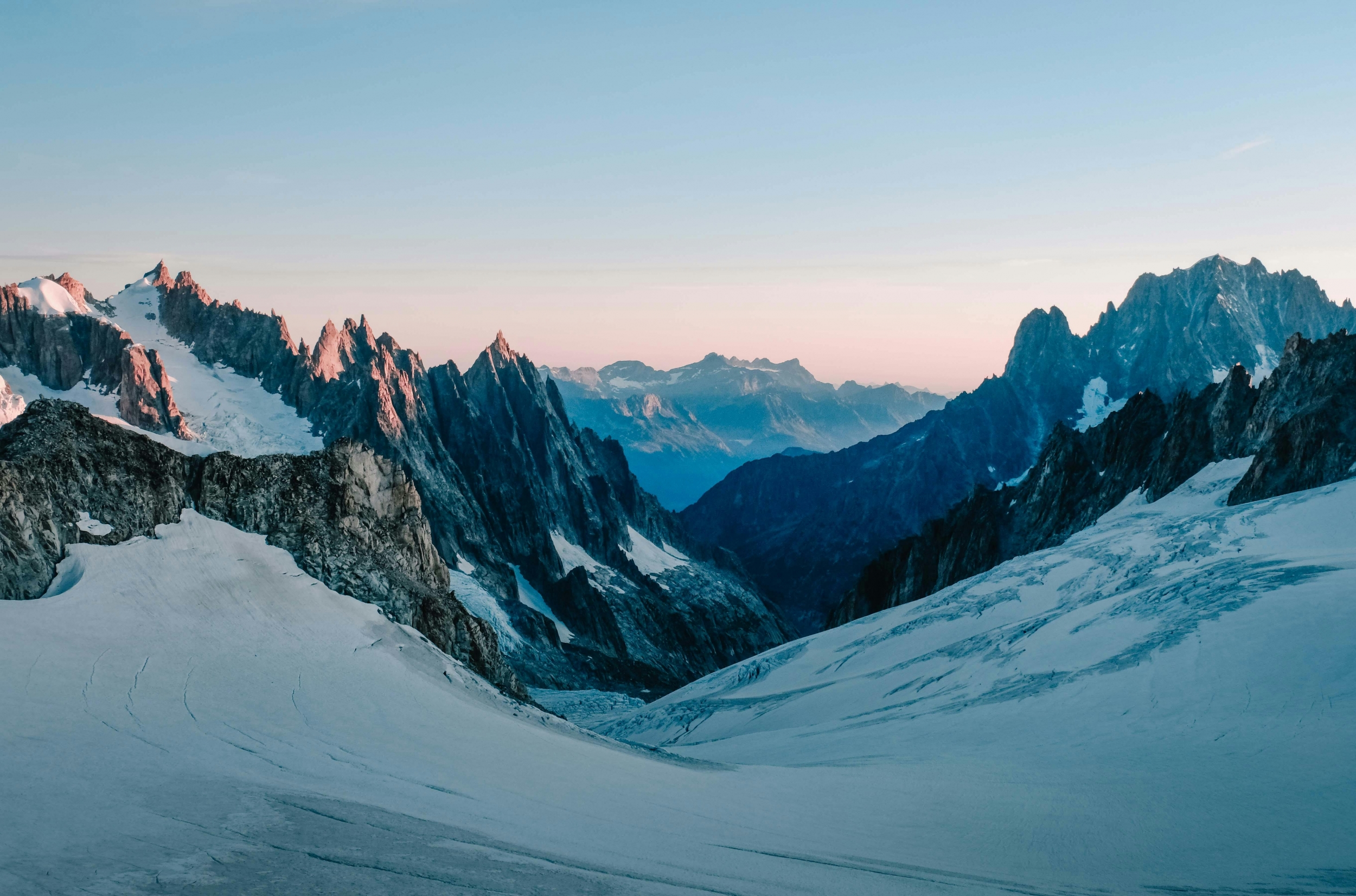 A Good Morning Sunrise From Snowcapped Mountains