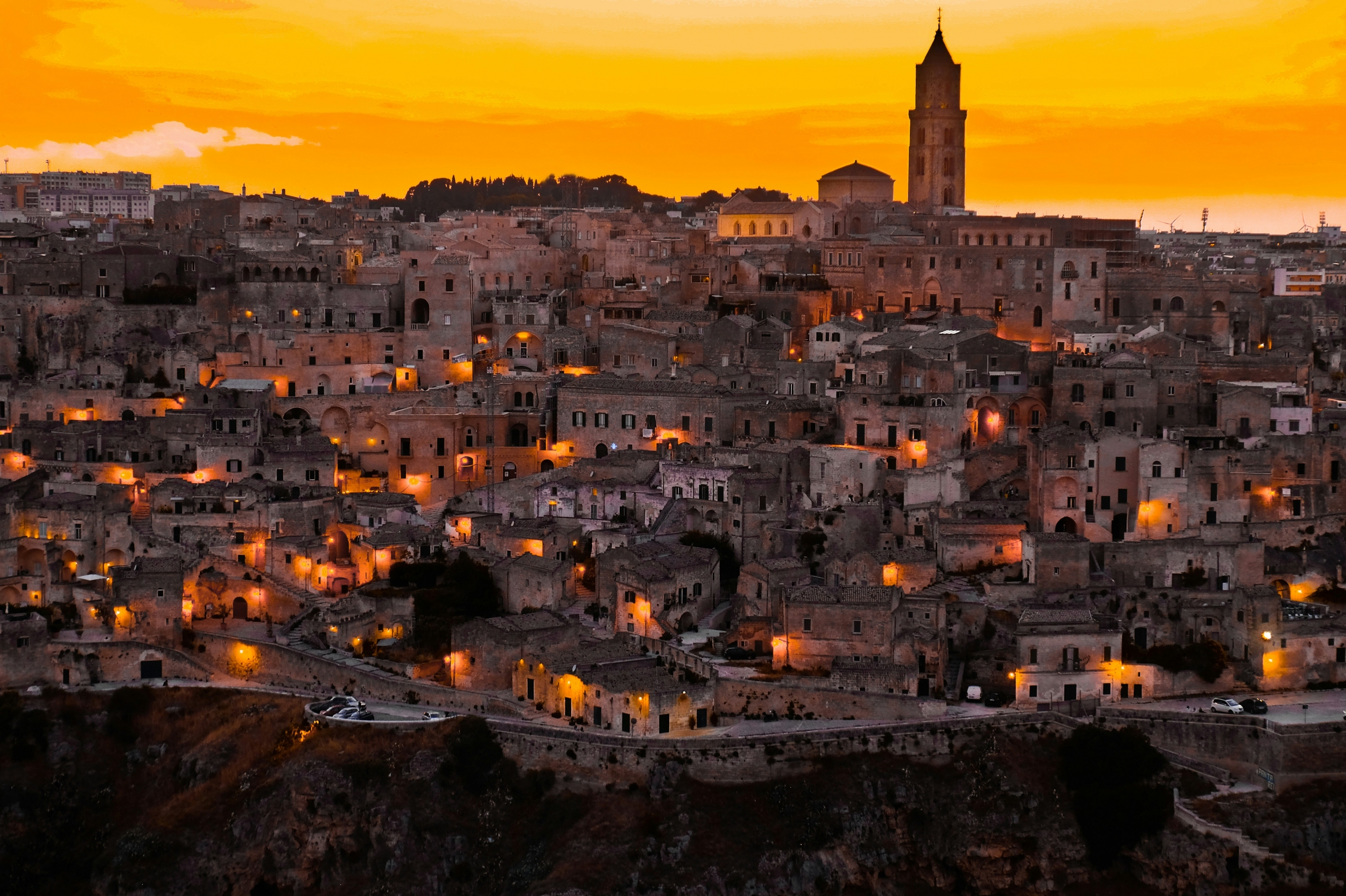 Ancient City At Night With Candlelight Glow wallpaper for Apple iPhone, Apple Watch, Mac, iPad and Apple Watch