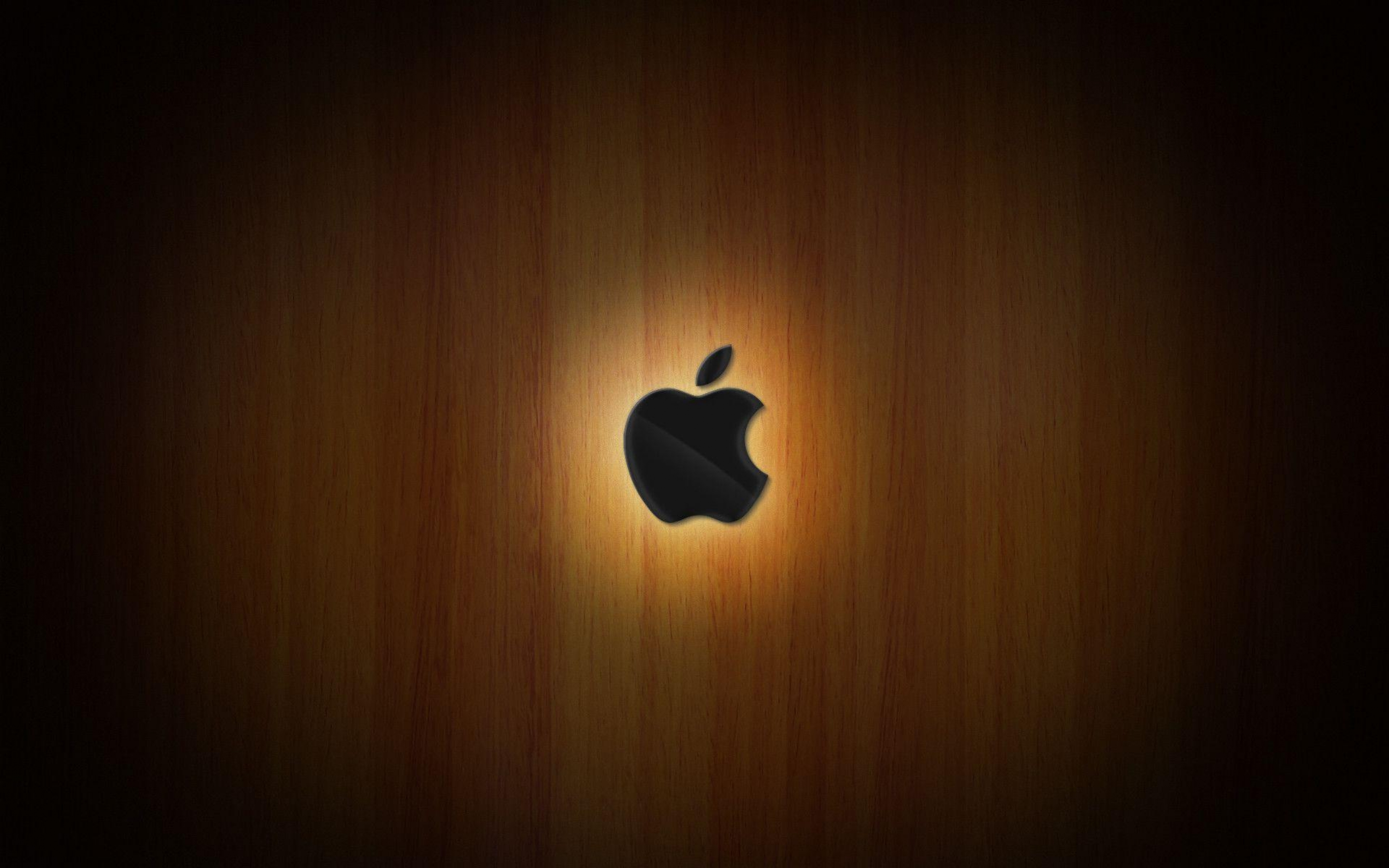 Apple Incorporated Logo On Wooden Skeuomorphism Backdrop