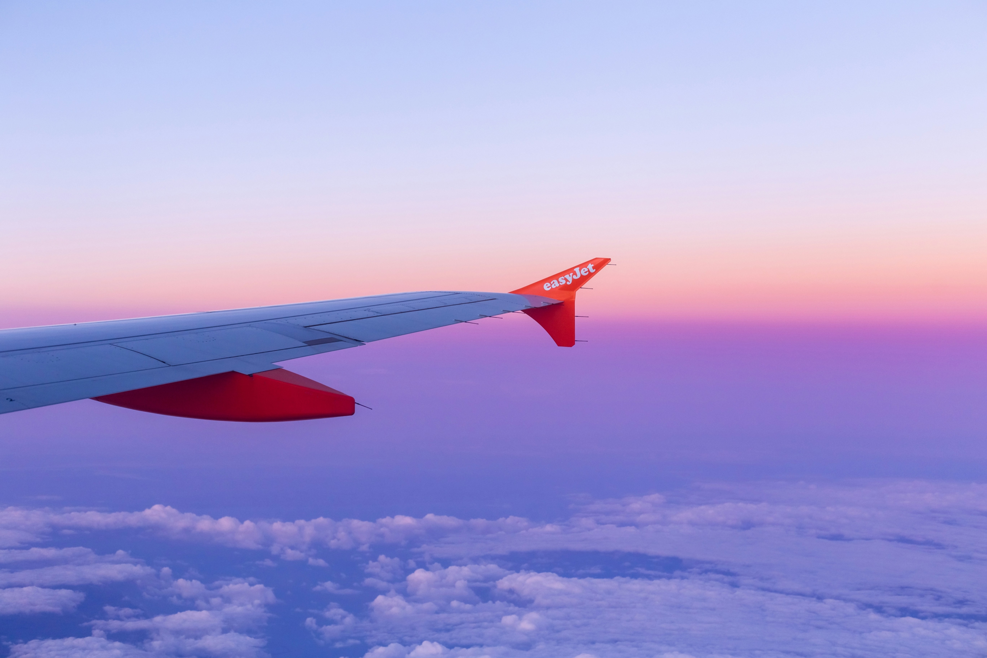 Beautiful Purple Sunset From The Wing Of A Plane