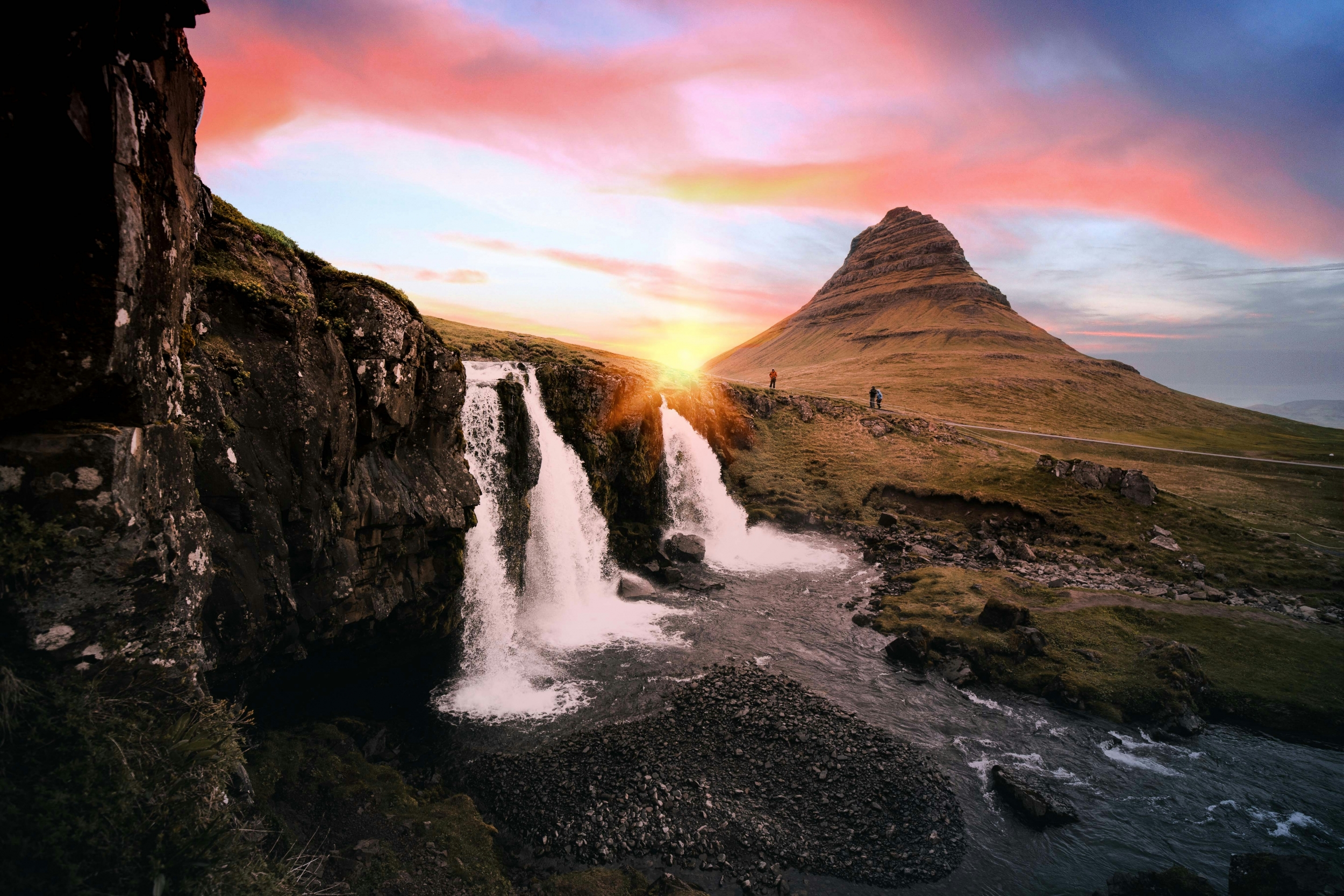 Bright Vibrant Sunset With Crashing Waterfall