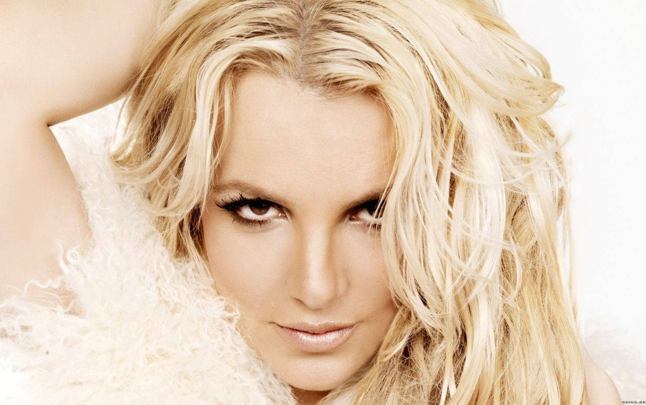 Britney Spears Femme Fatale White Background wallpaper for Apple iPhone, Apple Watch, Mac, iPad and Apple Watch