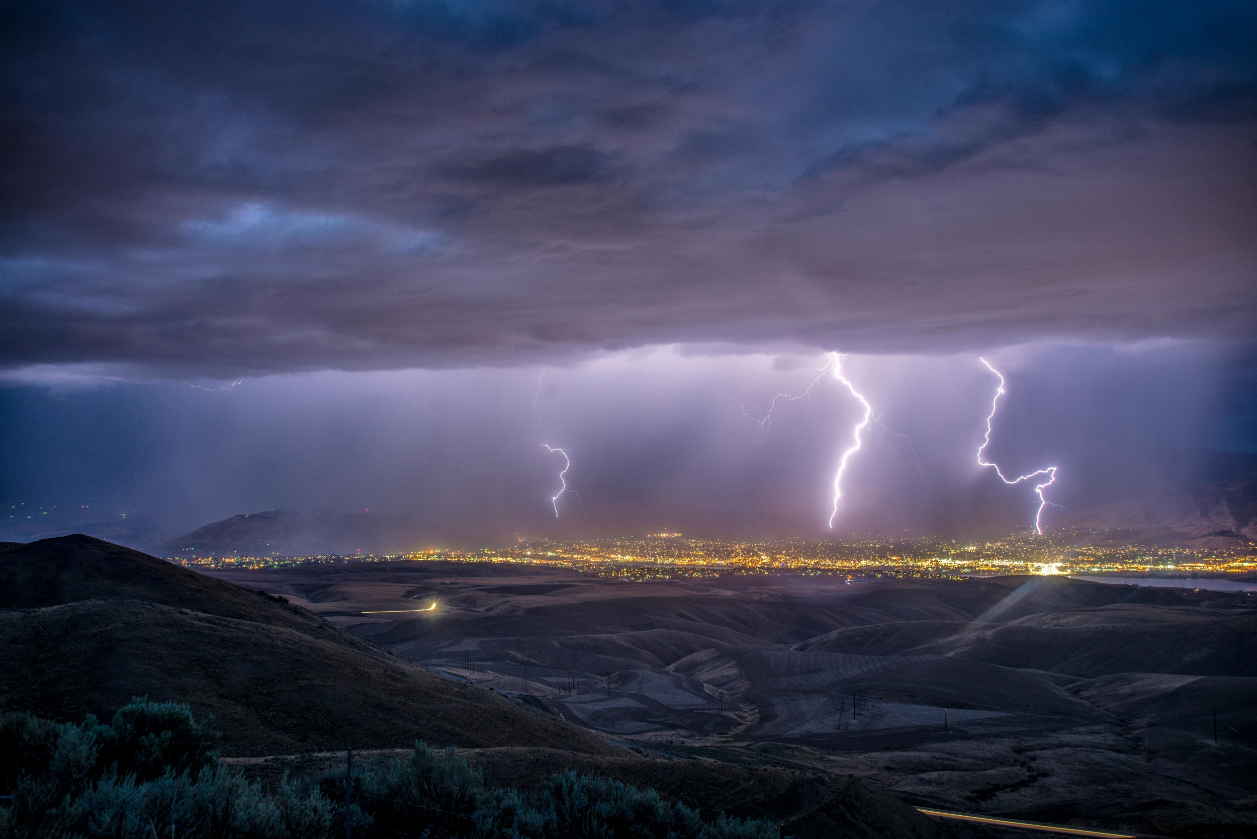 Incredible Thunderstorm Lashes A Small Town With Lightning Strikes Rain And Thunder wallpaper for Apple iPhone, Apple Watch, Mac, iPad and Apple Watch