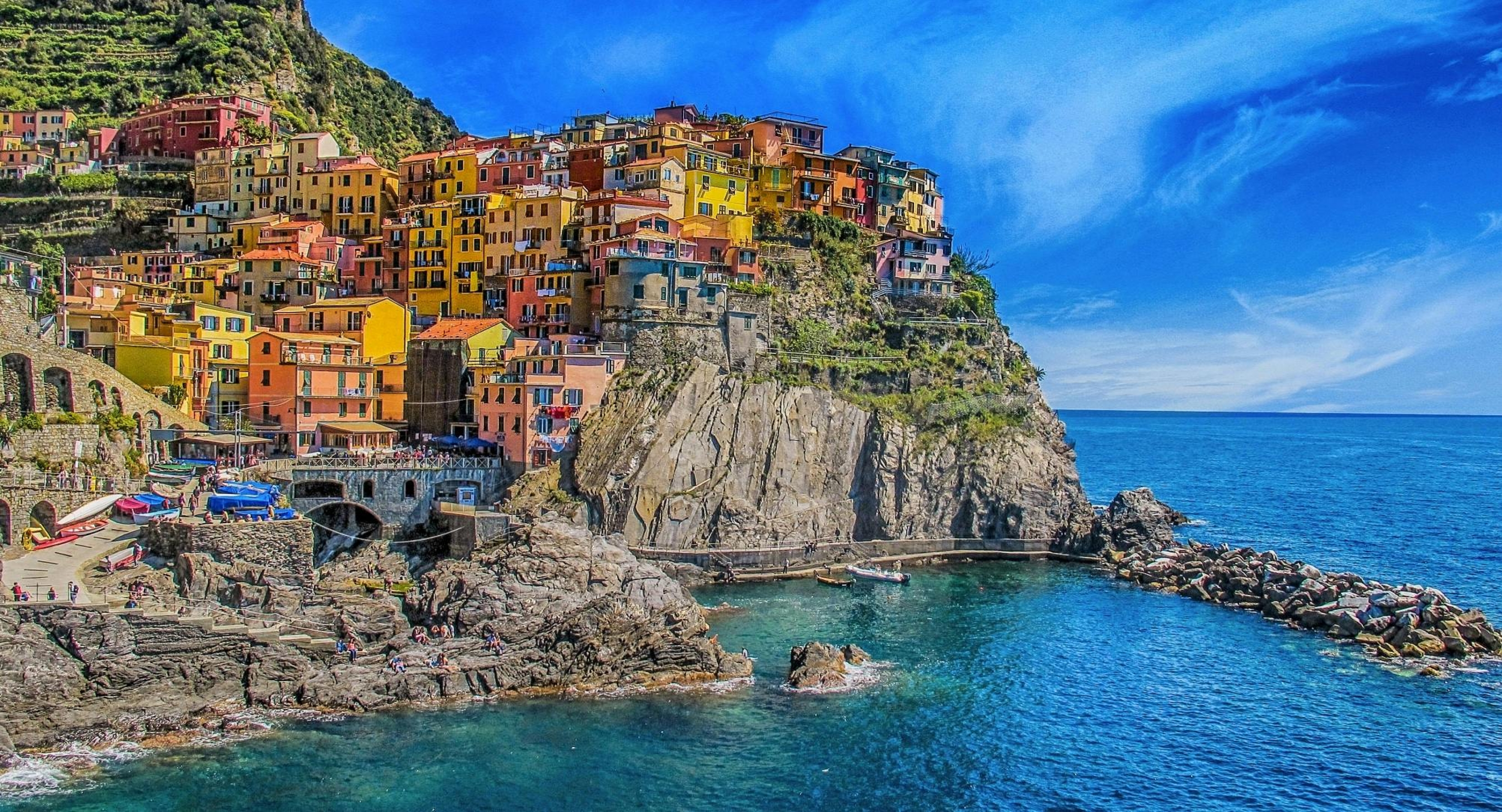 Italy Colorful Buildings By The Water Blue Sky Summer Rock Beach Cliffs