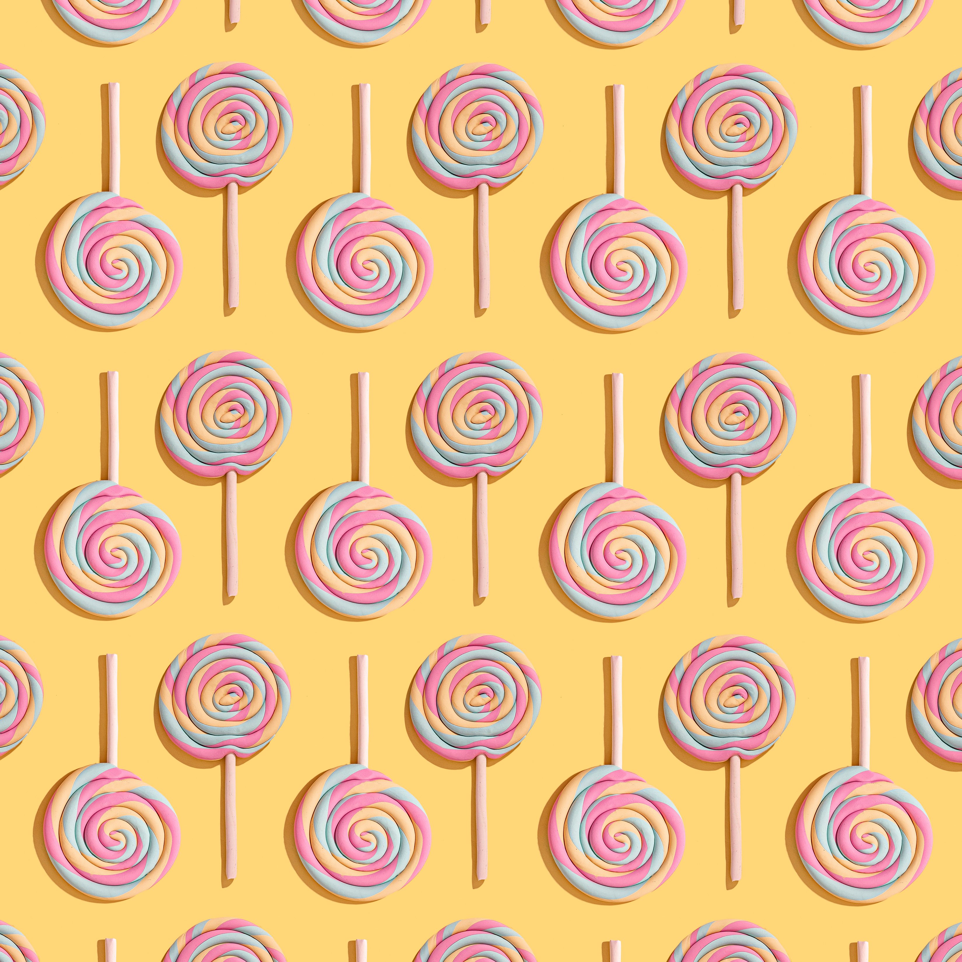 Lollipop Pattern Yellow Background Best Free Screensavers And Wallpapers For macOS Macs And WindowsOS PCs HD 5K wallpaper for Apple iPhone, Apple Watch, Mac, iPad and Apple Watch