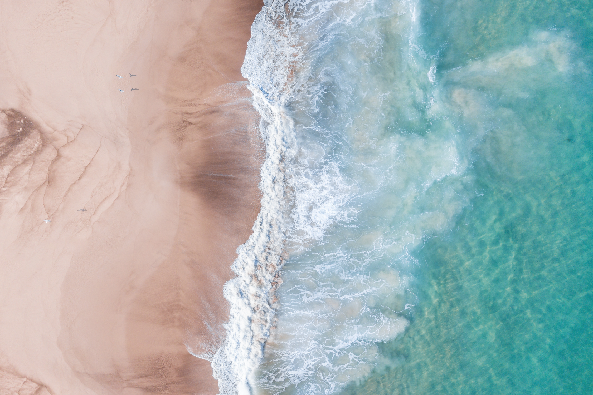 Microsoft Windows 10x Stock Beach Waves From Above wallpaper for Apple iPhone, Apple Watch, Mac, iPad and Apple Watch