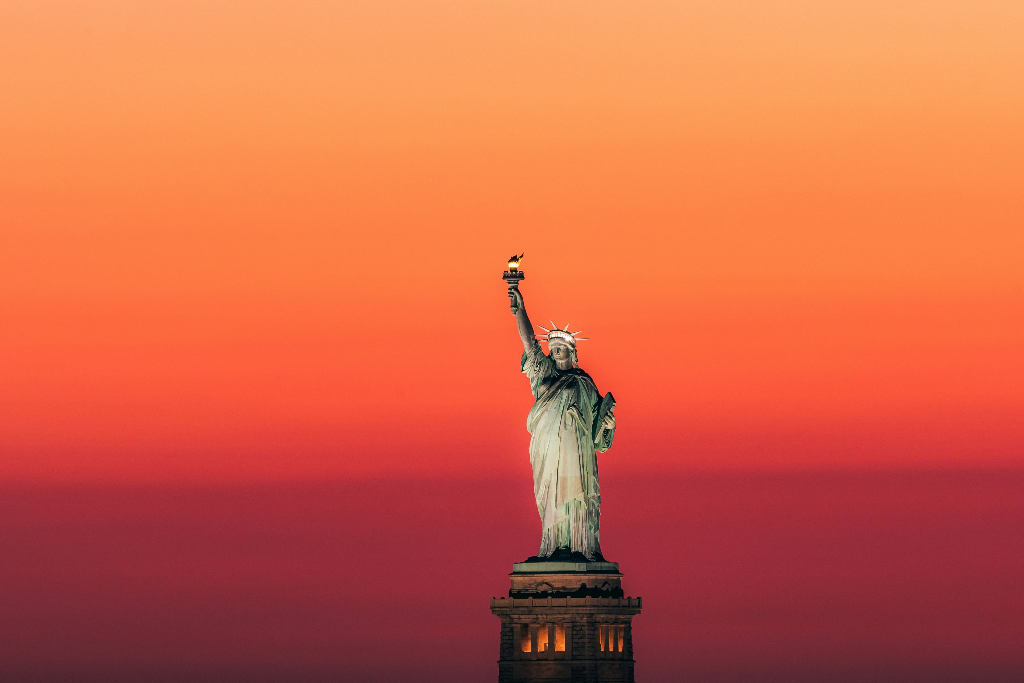 New York City Statue Of Liberty At Sunset Newyork