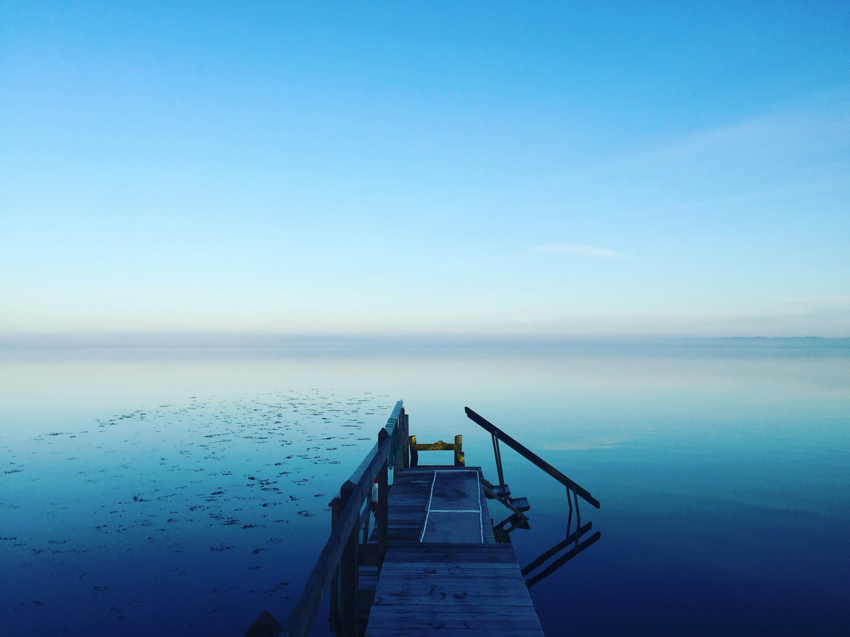 Pier On A Blue Lake