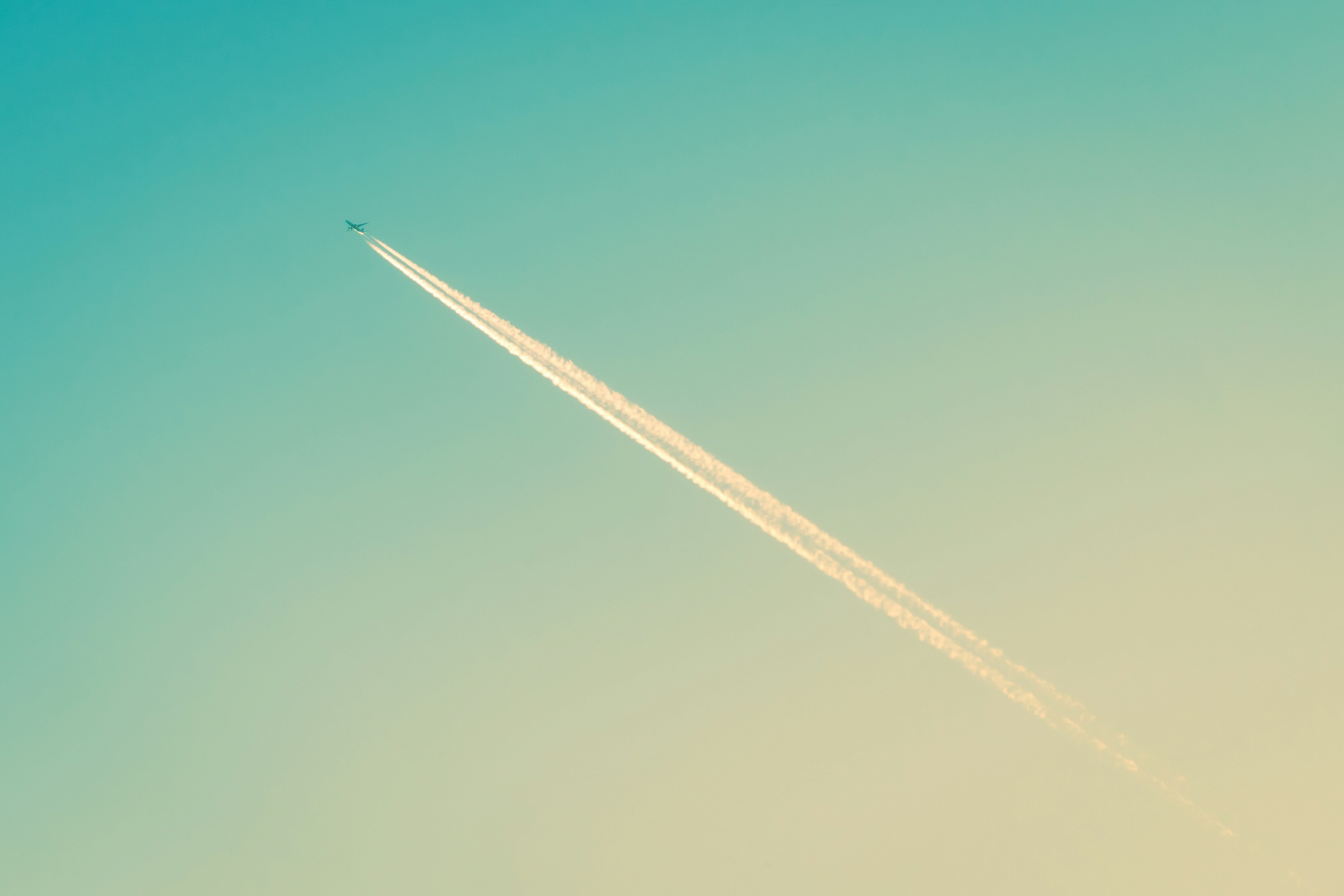 Plane Contrail In A Blue Sky