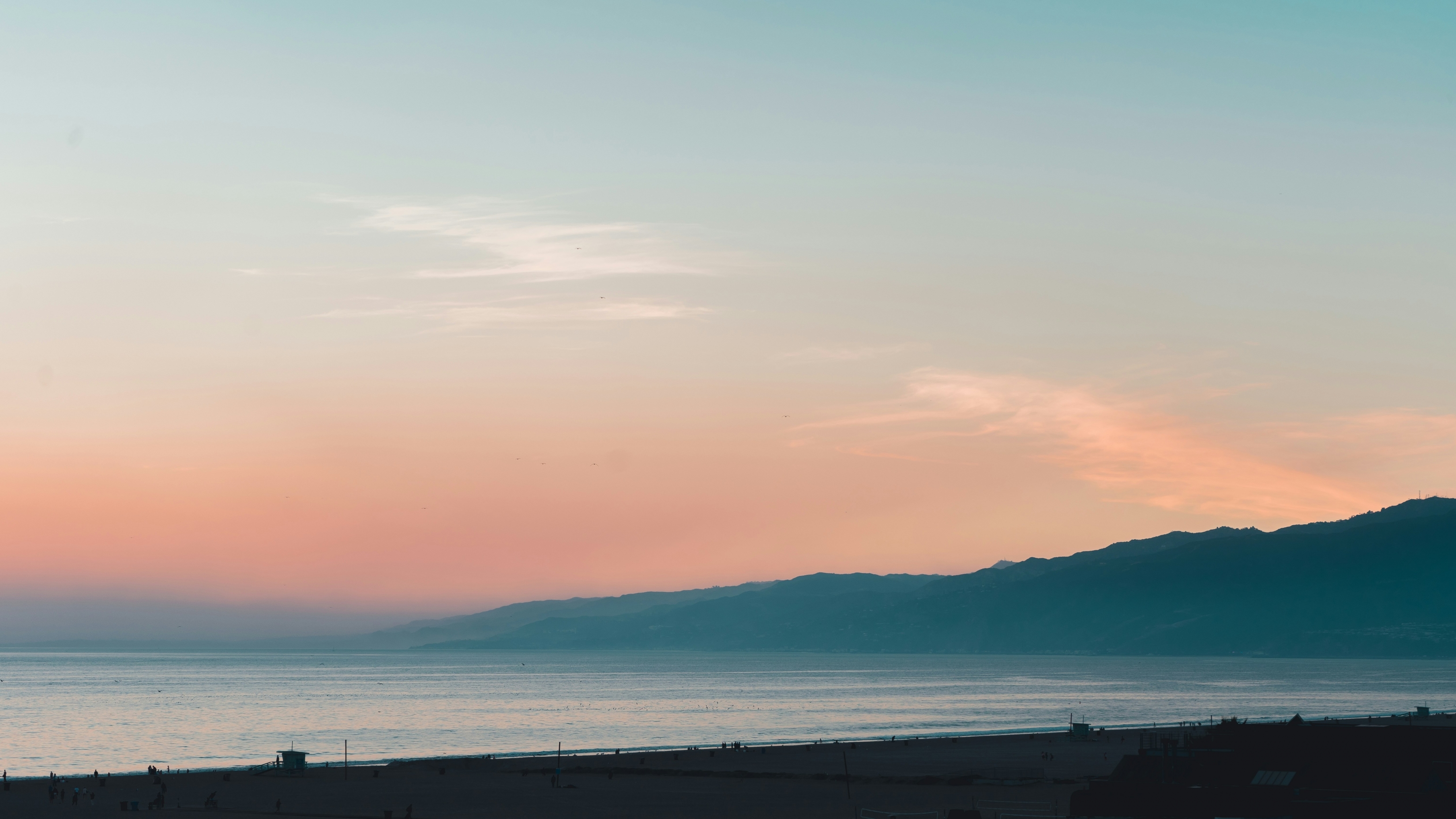 Pretty Sunset Over A Mountain And Ocean