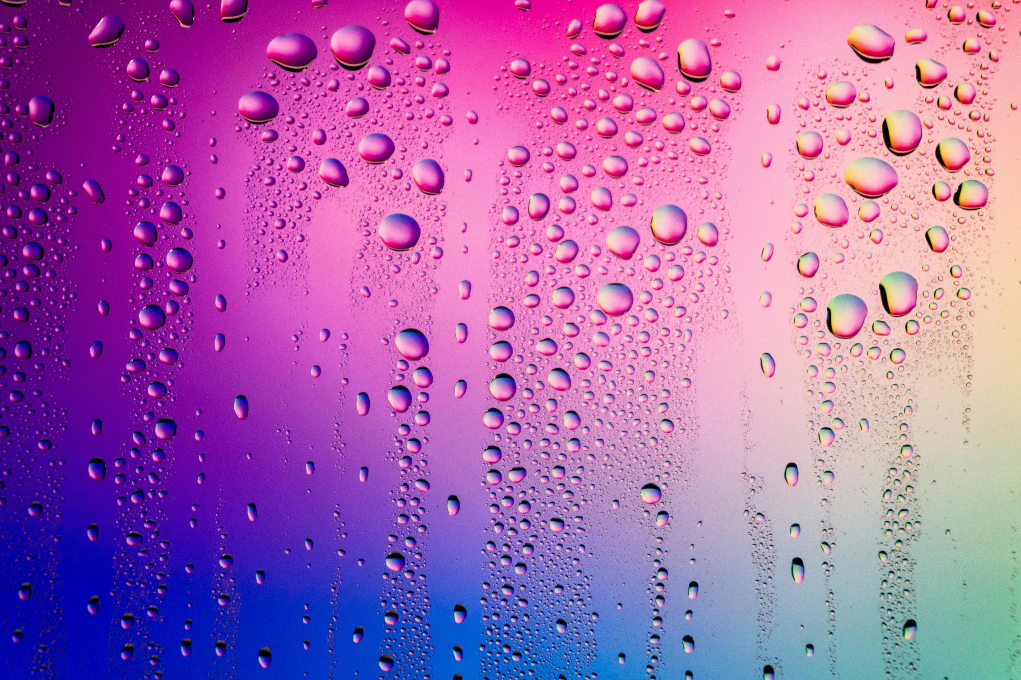 Rainbow Water Droplets On A Windshield Glass Purple wallpaper for Apple iPhone, Apple Watch, Mac, iPad and Apple Watch