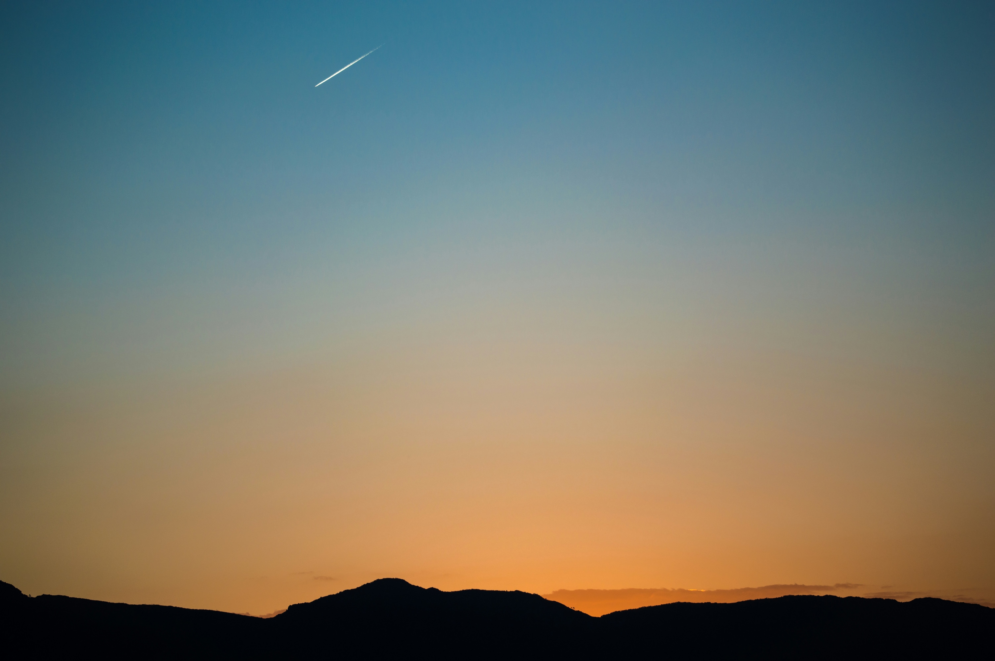 Shooting Star In The Sunrise Sky wallpaper for Apple iPhone, Apple Watch, Mac, iPad and Apple Watch