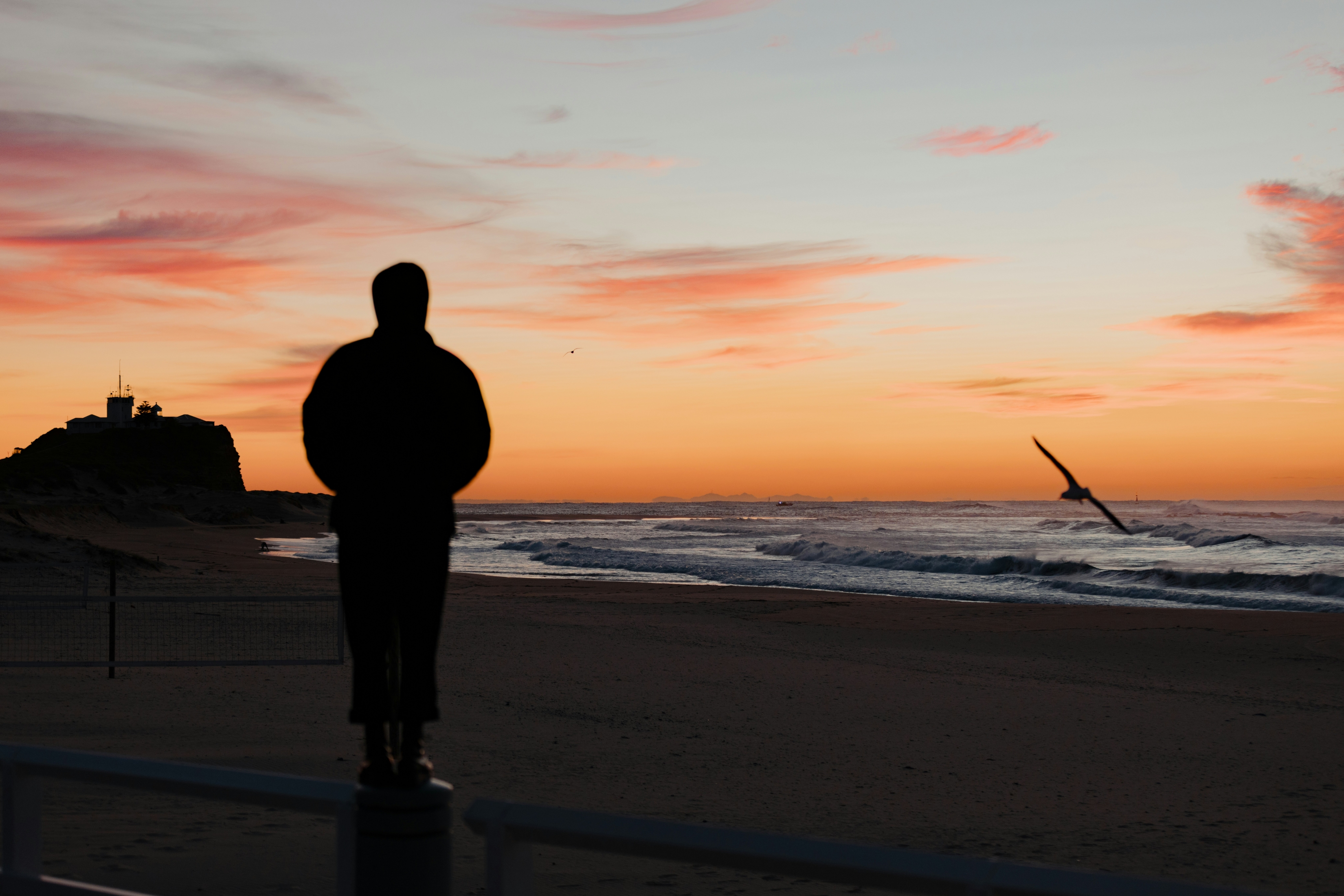 Silhouette Of Guy At The Beach wallpaper for Apple iPhone, Apple Watch, Mac, iPad and Apple Watch