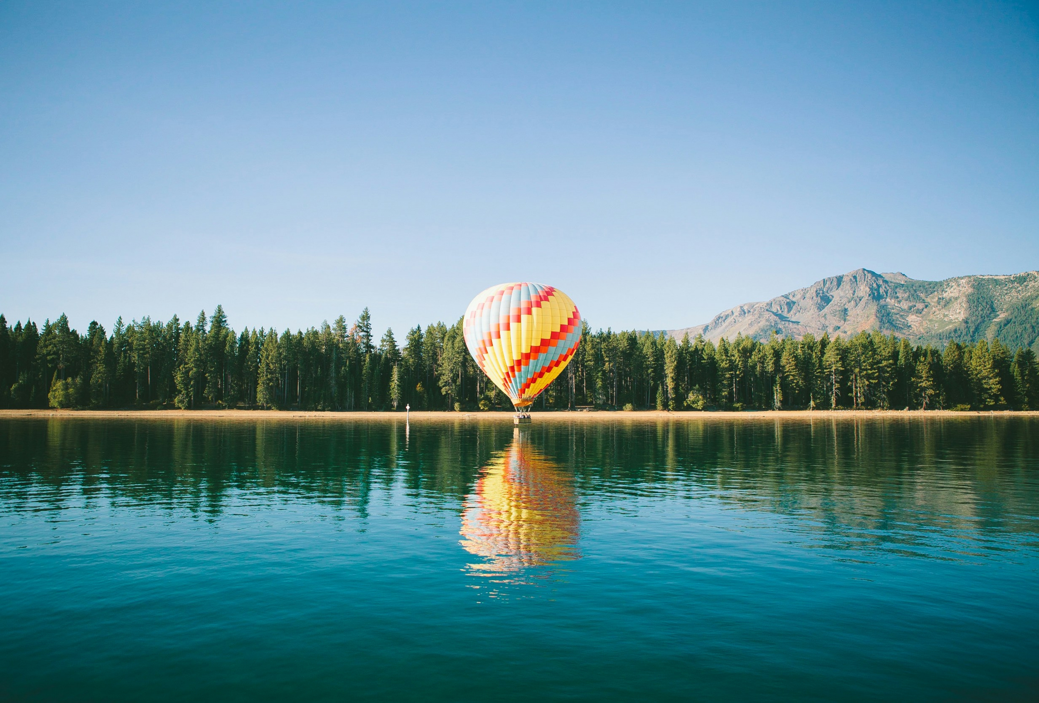 Single Hot Air Balloon On The Lake