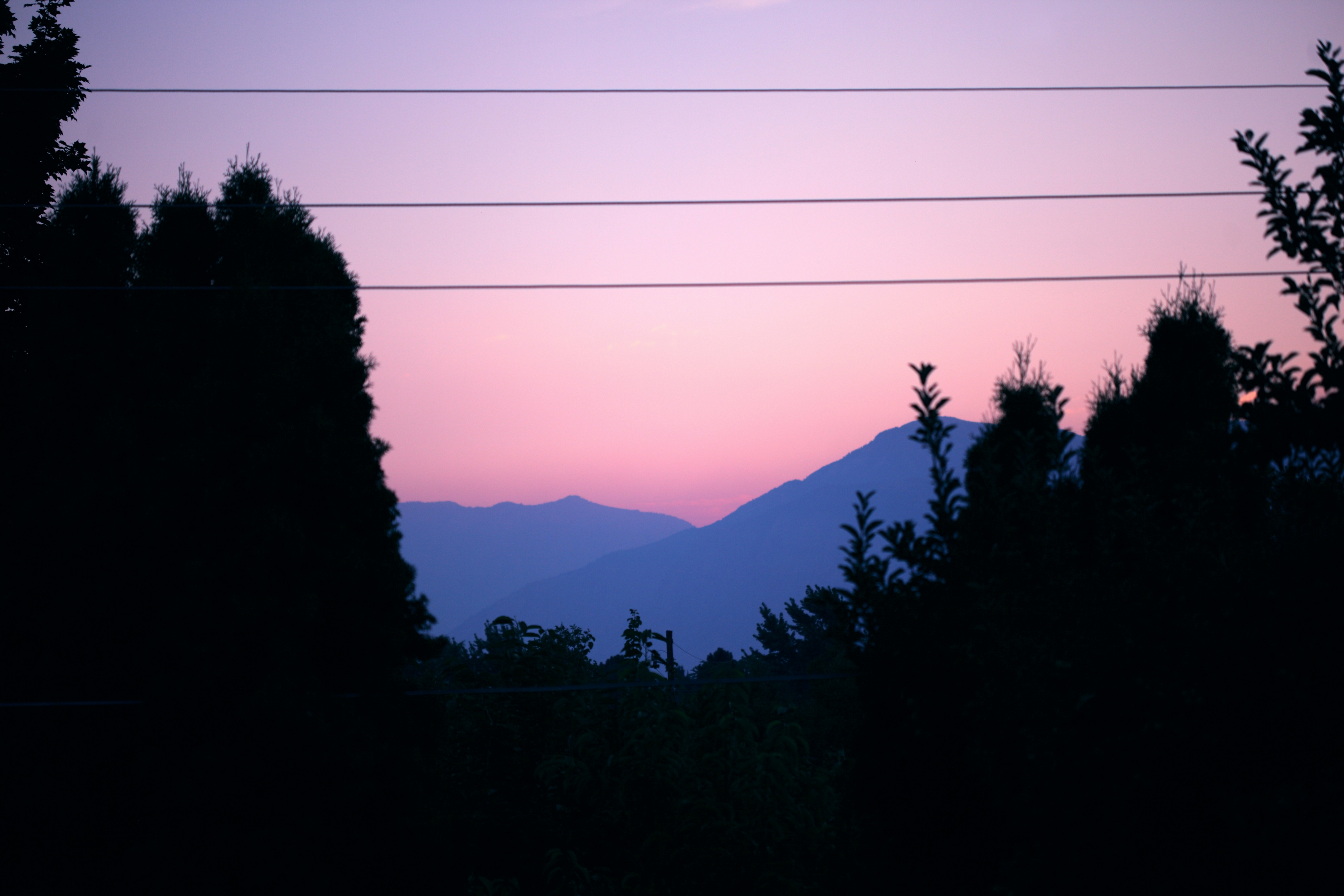 Sunrise Over Mountains With Powerlines